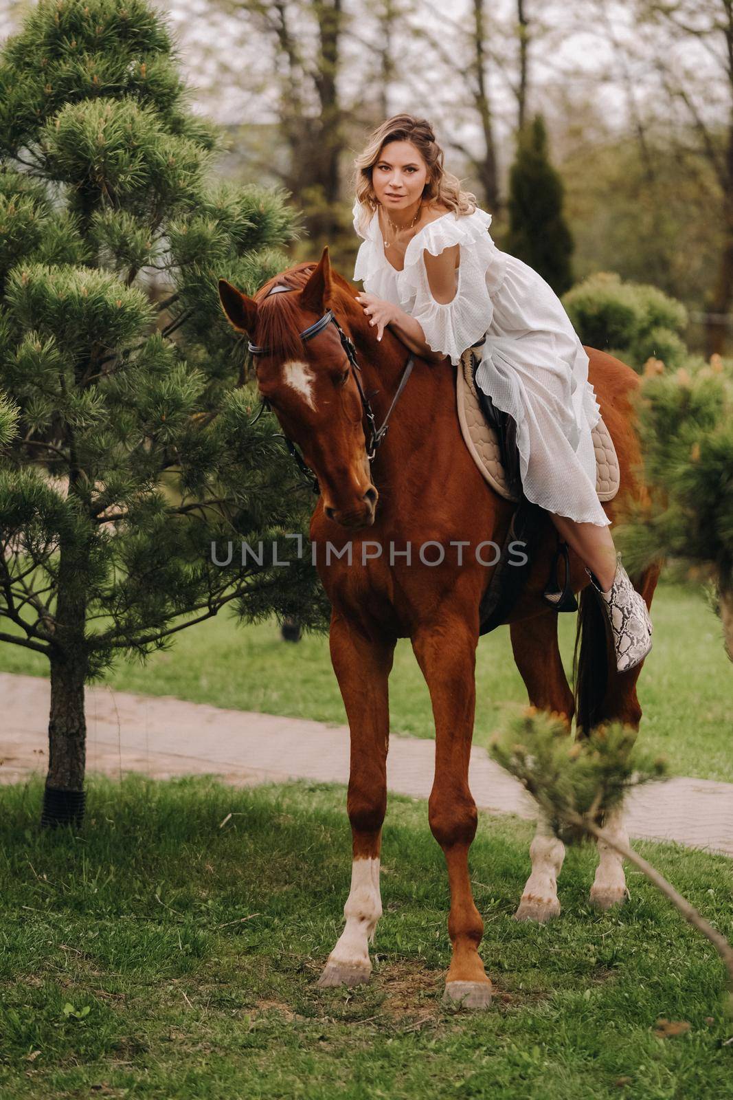 A woman in a white sundress riding a horse near a farm by Lobachad