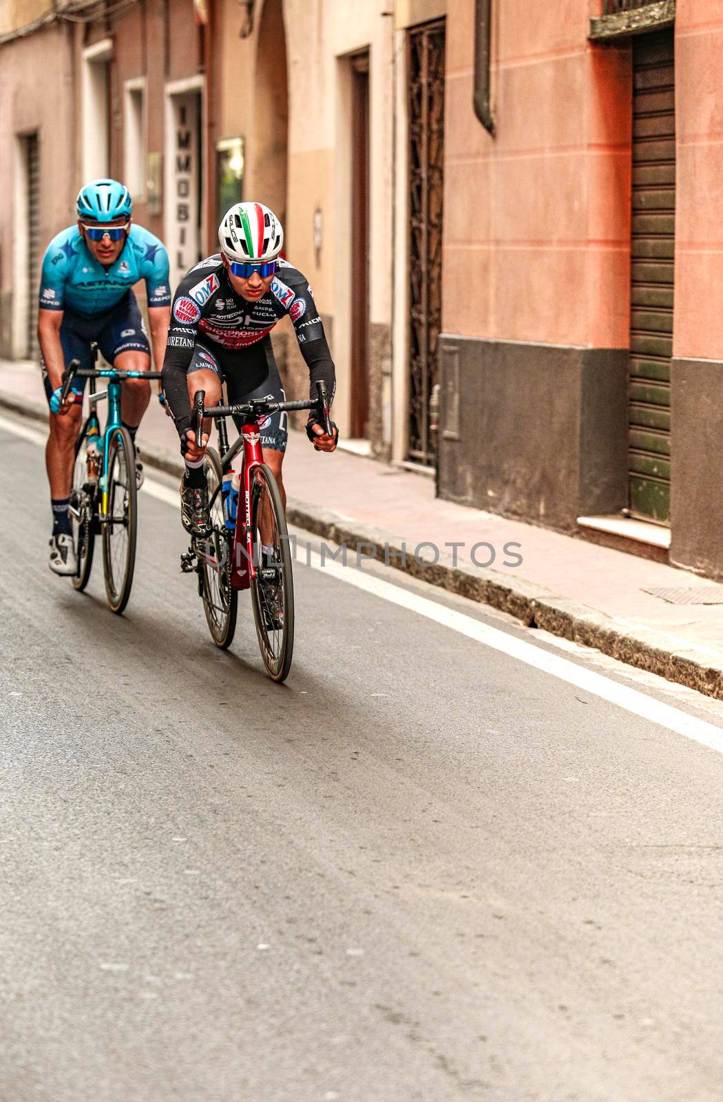 Imperia, IM, Liguria, Italy - March 20, 2022: An important cycling race in a small town in Italy in March. The name of the competition is Milano-Sanremo 2022