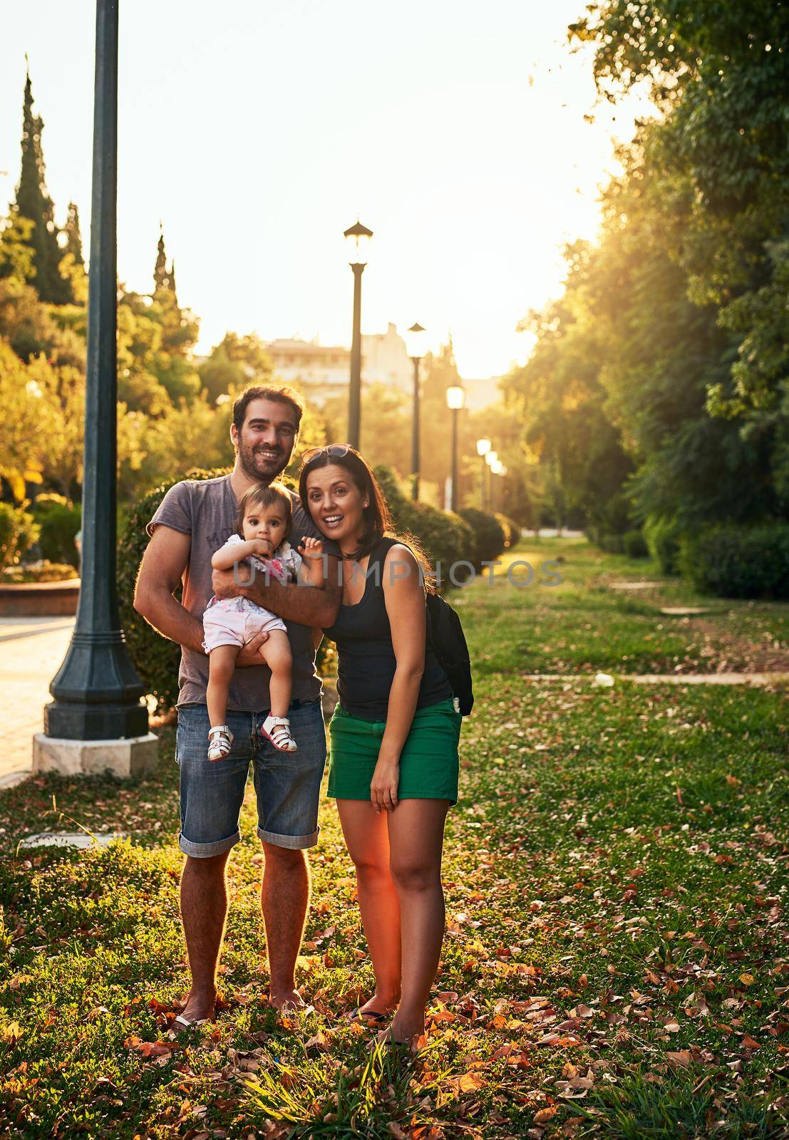 Shot of a young family outdoors.