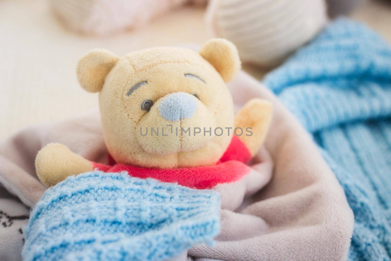 Cute little teddy bear soft toy for a baby child