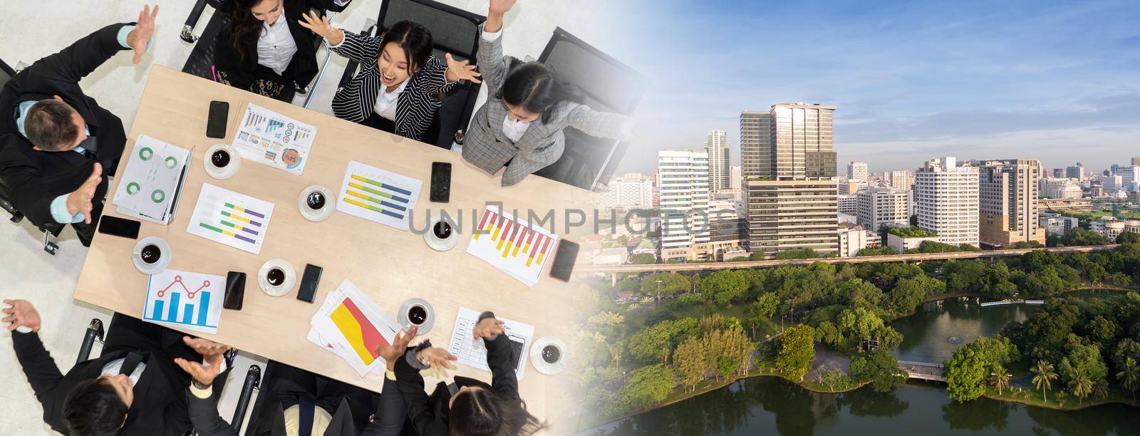 Successful business people celebrate together with joy at office table shot from top view . Young businessman and businesswoman workers express cheerful victory showing teamwork in broaden view .