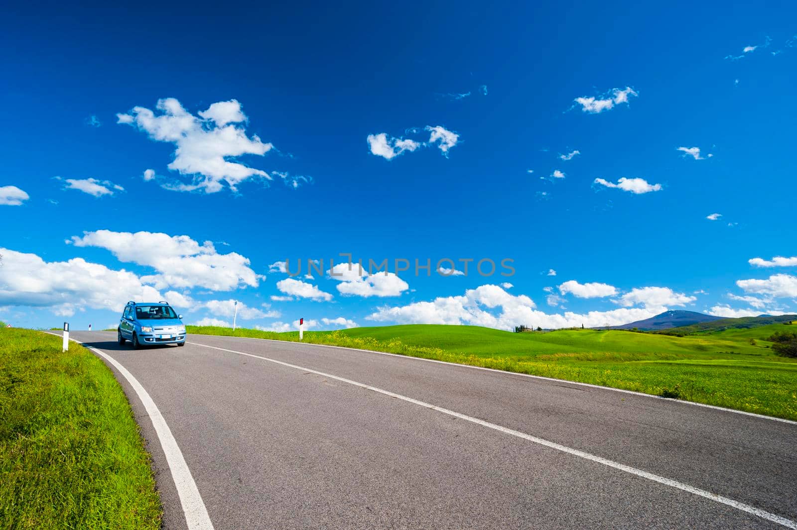 Car driving in the road.