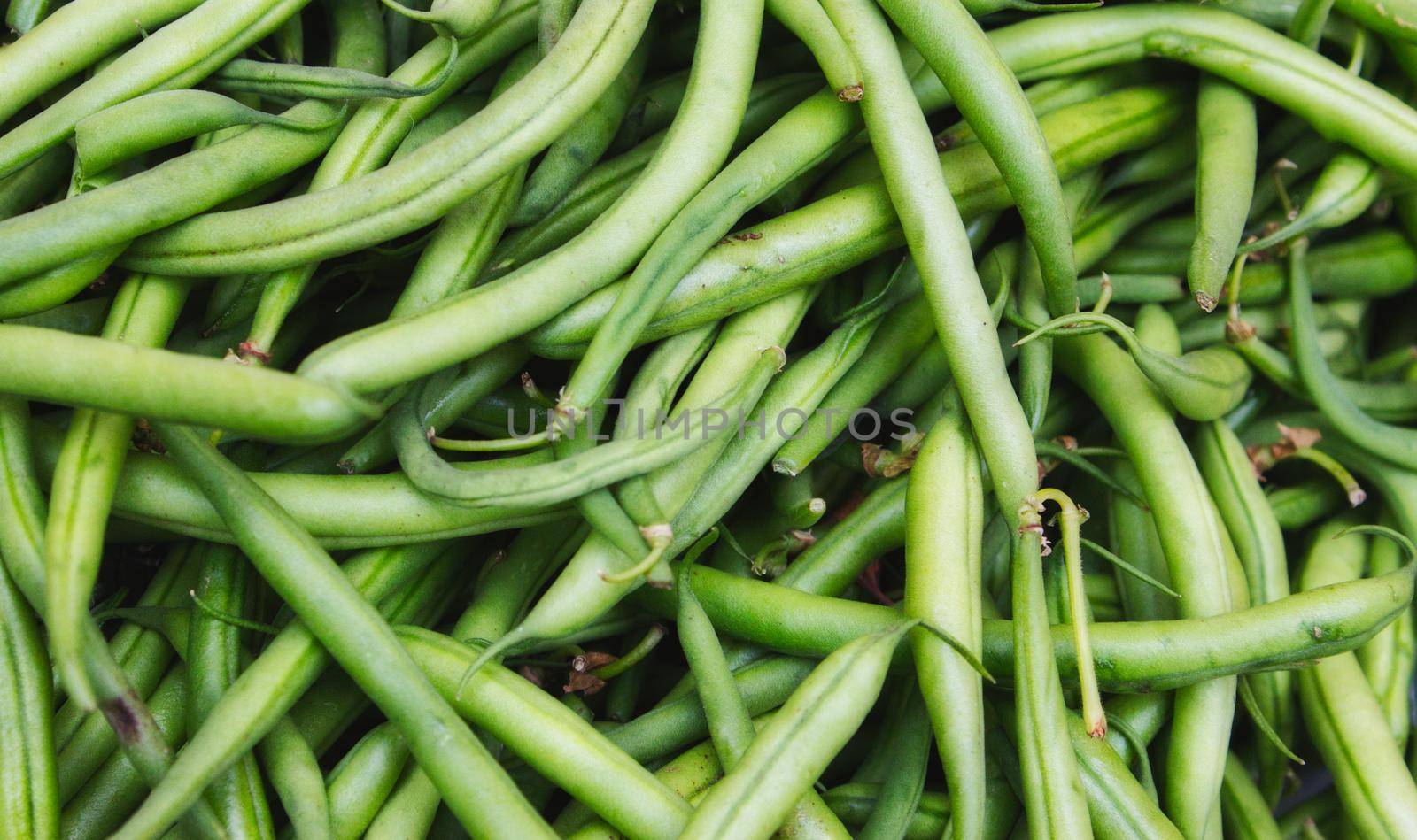 A heap of green runner beans by tennesseewitney