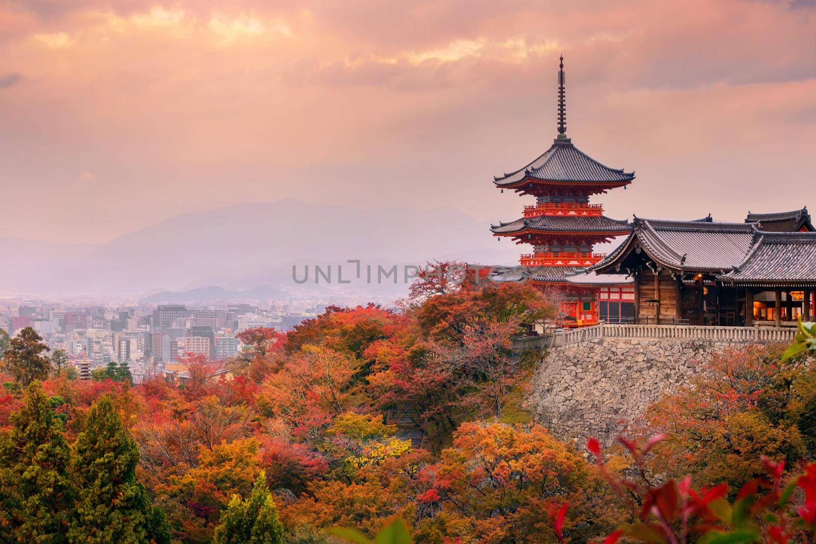 Sunrise over Sanjunoto pagoda and Kiyomizu-dera Temple in the autumn season, Kyoto, Japan
