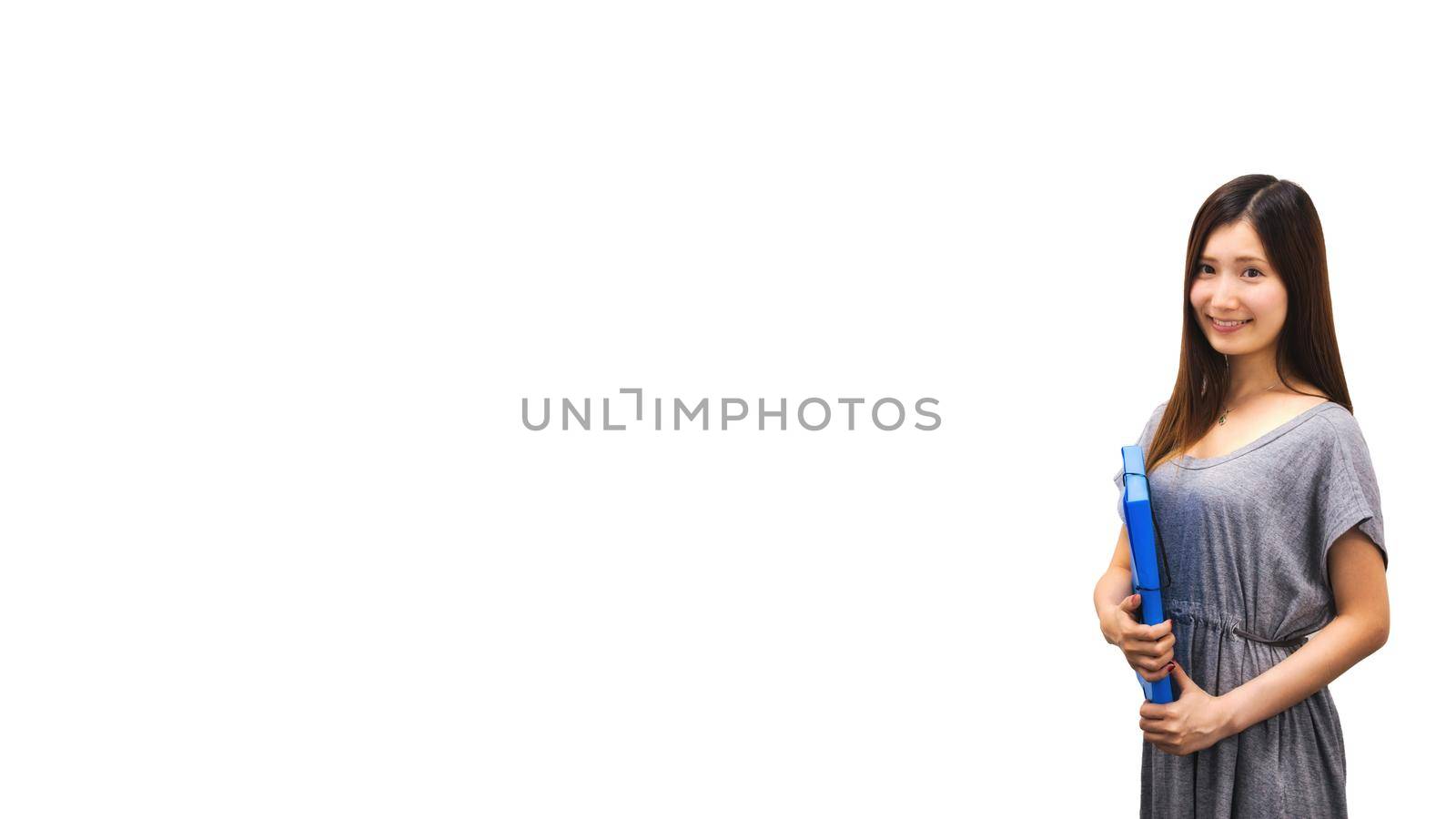 Pretty Japanese woman standing against a pure white background holding a blue plastic folder