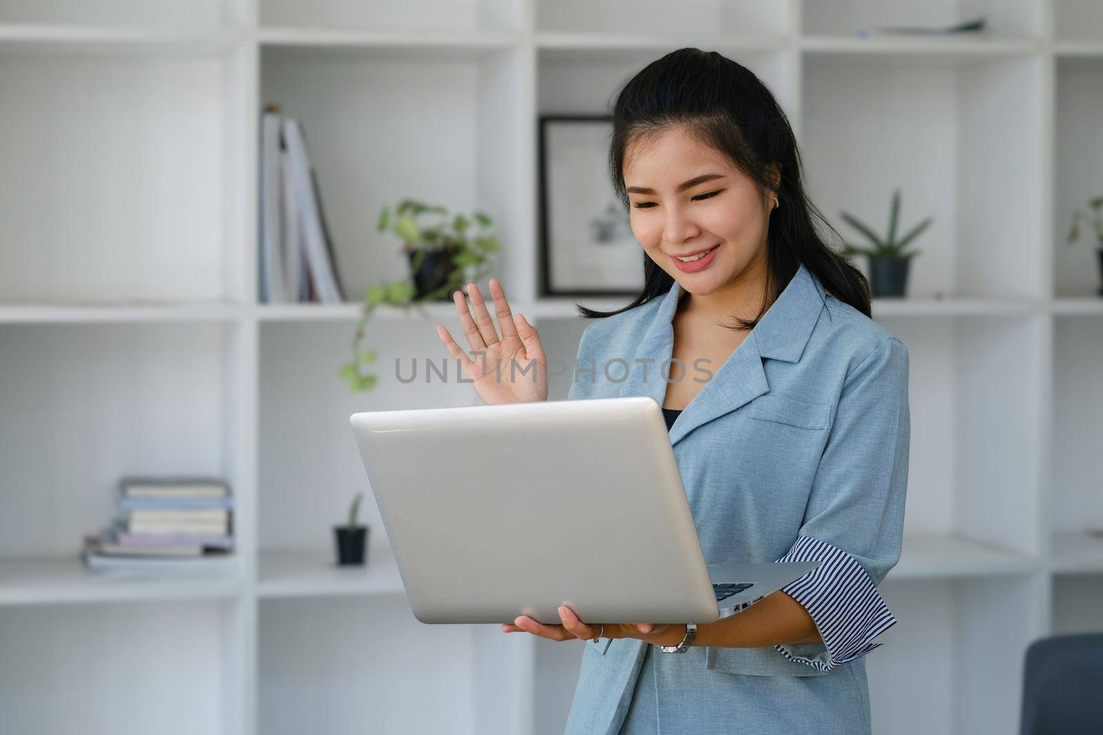 data analysis, budget calculation, research, risk management, portrait of Asian women using computers and financial documents in capital planning to increase company profits.