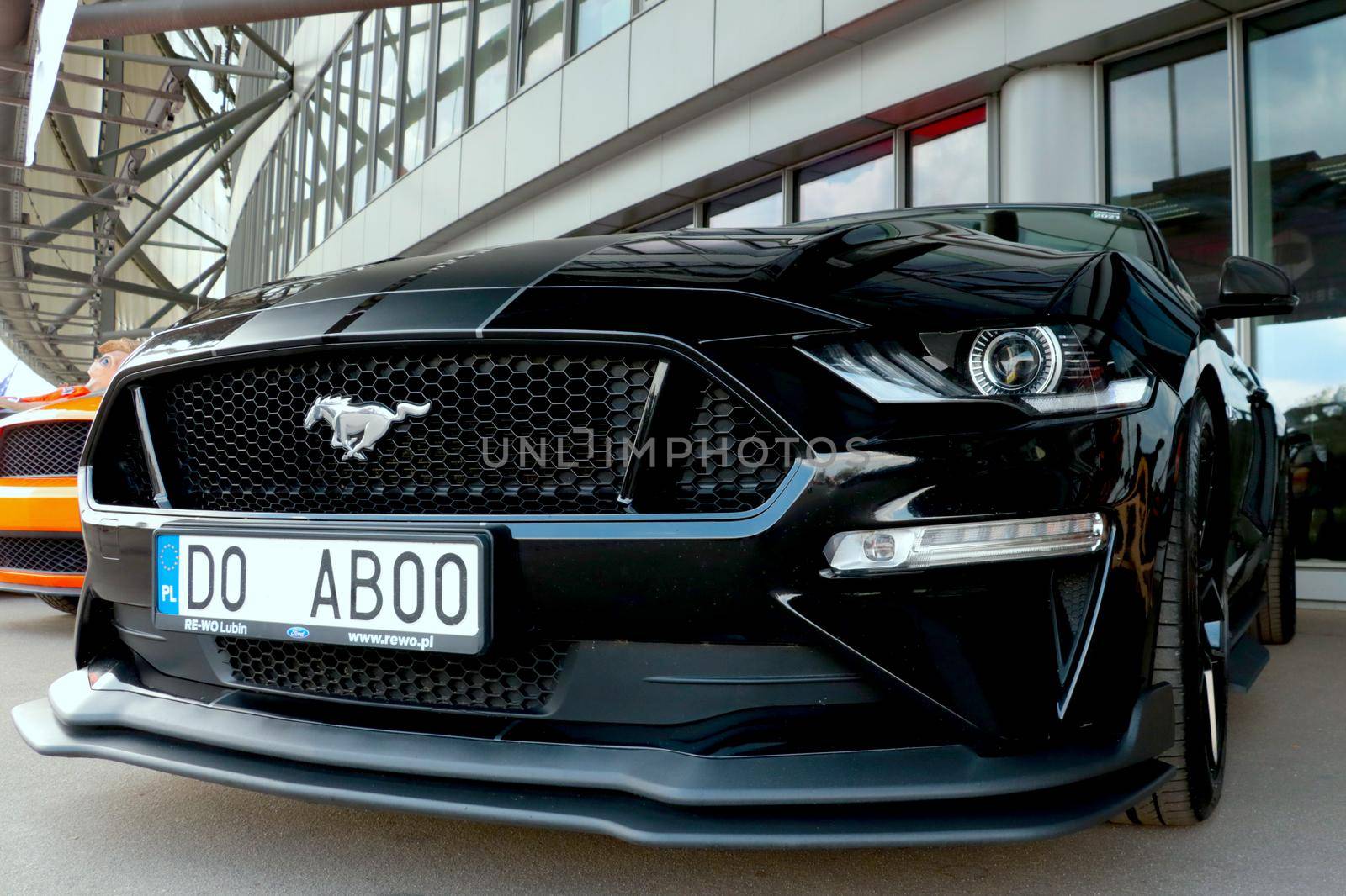 Wroclaw, Poland, August 25, 2021: the front of a sporty powerful black car Ford Mustang