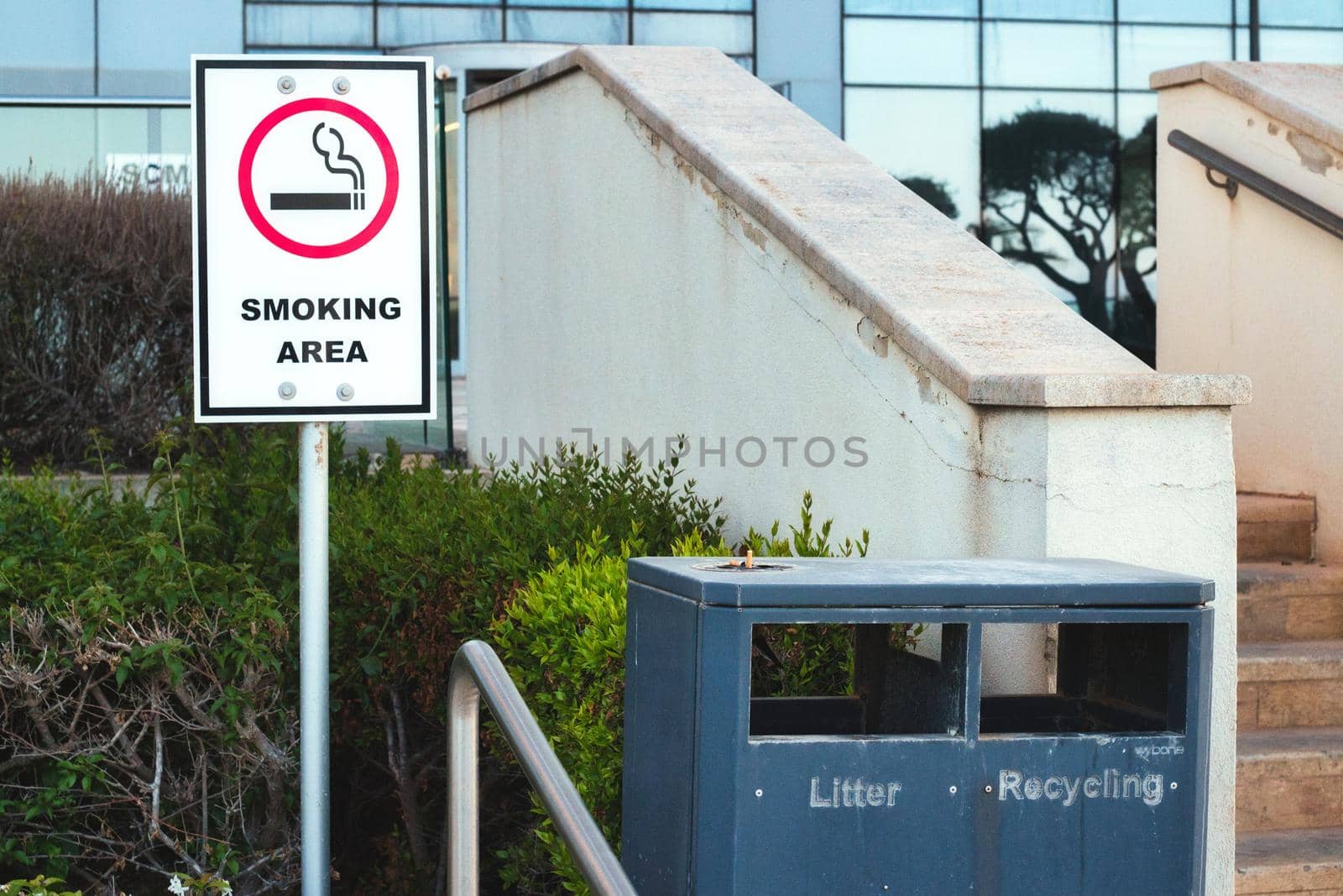 A designated outdoor smoking area outside an office block by tennesseewitney