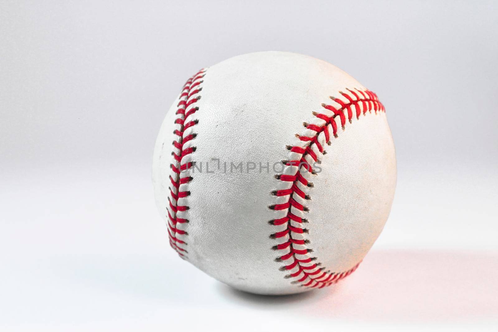 A baseball isolated against a white background