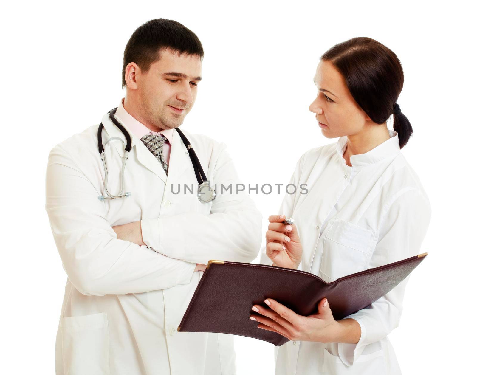 Two cheerful doctors discussing something. Isolated on white