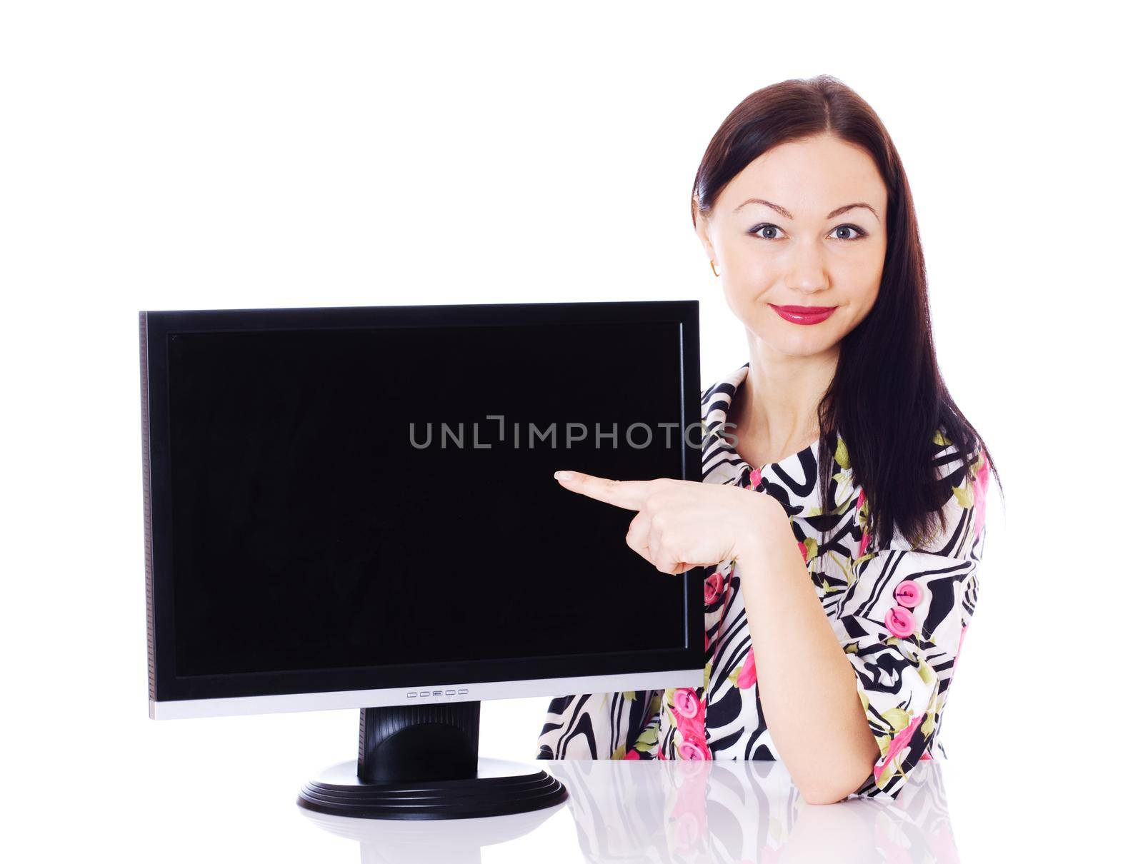 Beautiful woman presenting monitor