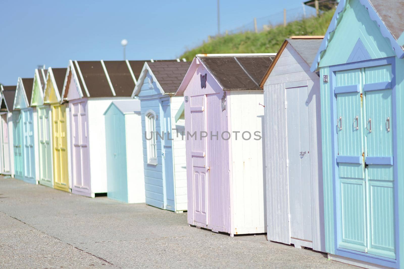 Colored wooden houses on the ocean coast bathing cabins at Saint aubin sur mer