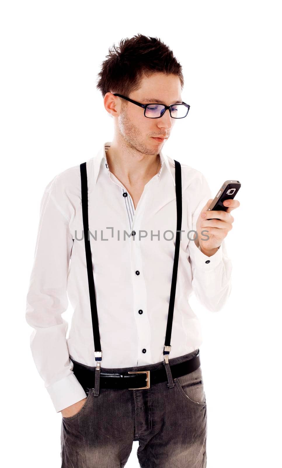 Male looking at mobile phone and reading message. Isolated on white.