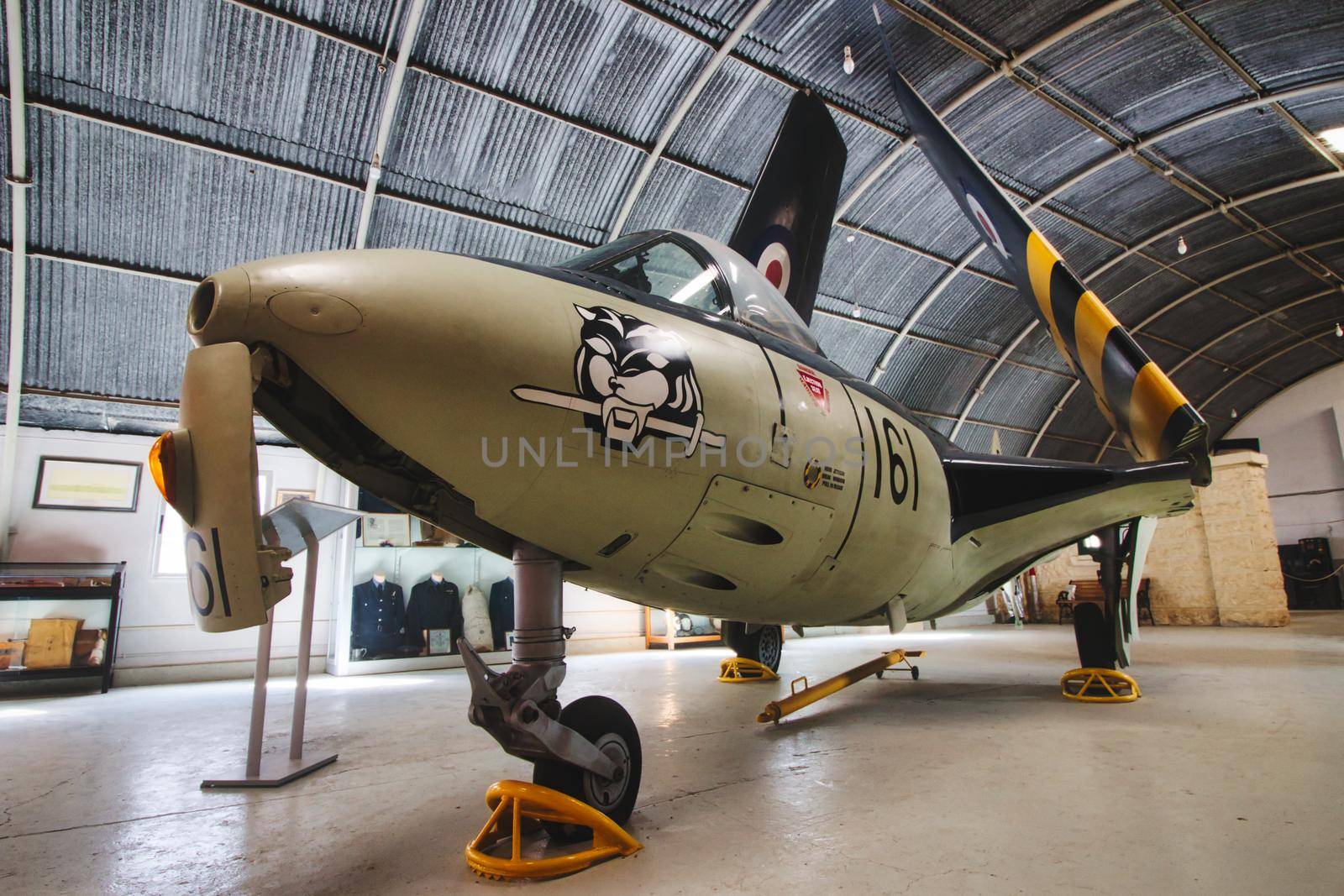 Ta' Qali, Malta - November 04 2020: Royal Air Force Hawker Sea Hawk in the Maltese aviation museum hangar with the wings folded up by tennesseewitney