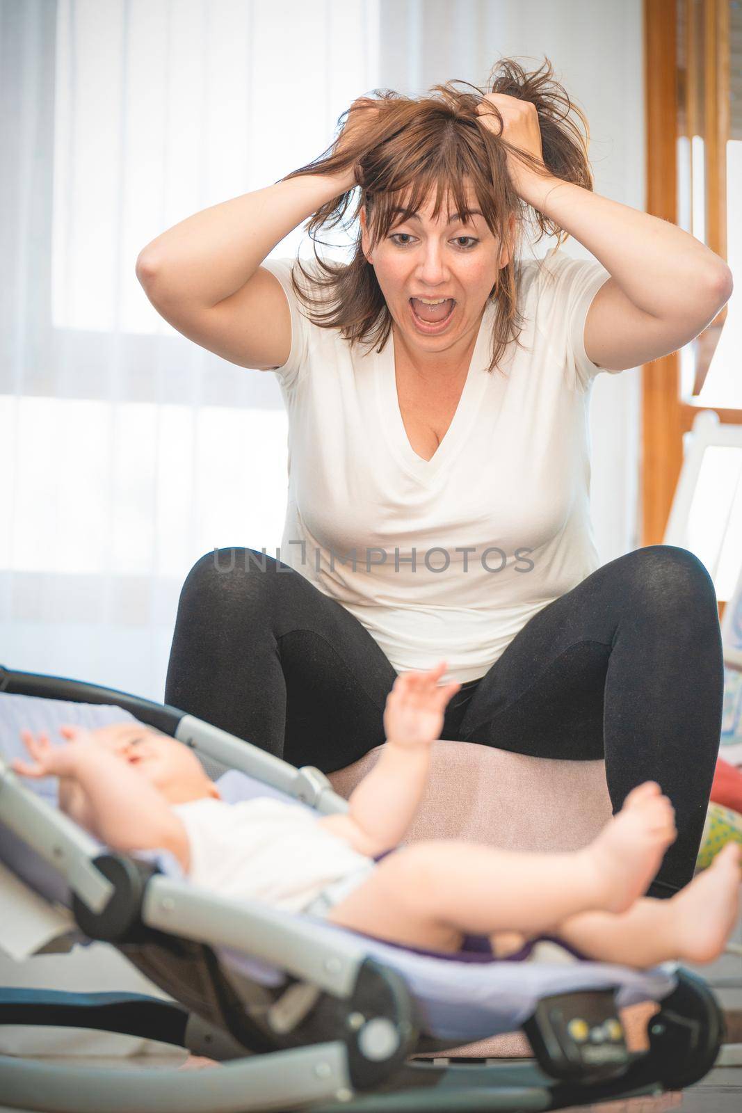 Tired Mother Suffering from experiencing postnatal depression.Health care single mom motherhood stressful. High quality photo