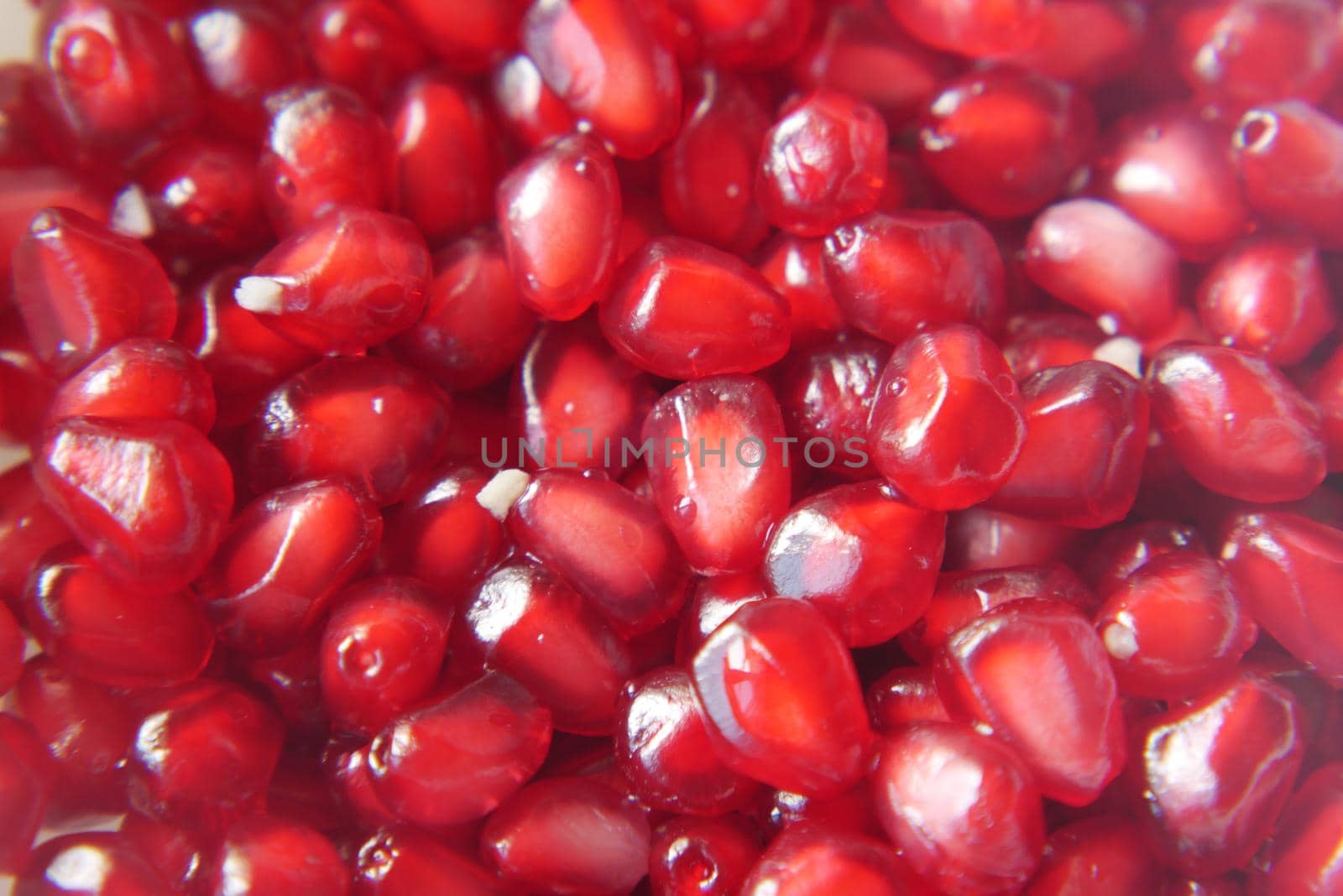 detail shot of pomegranate on table .