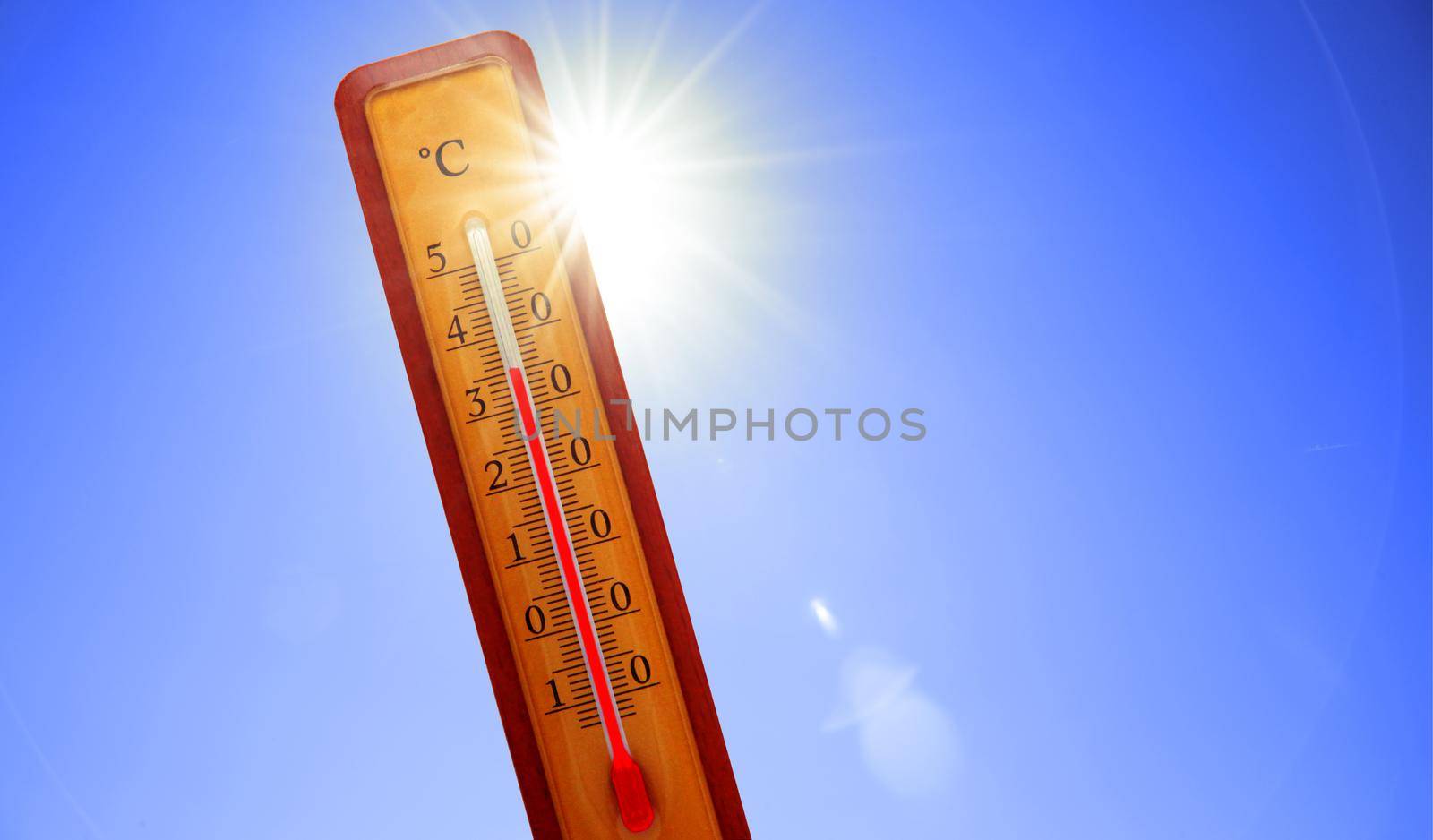 Thermometer with celsius scale showing extreme high temperature. by Taut