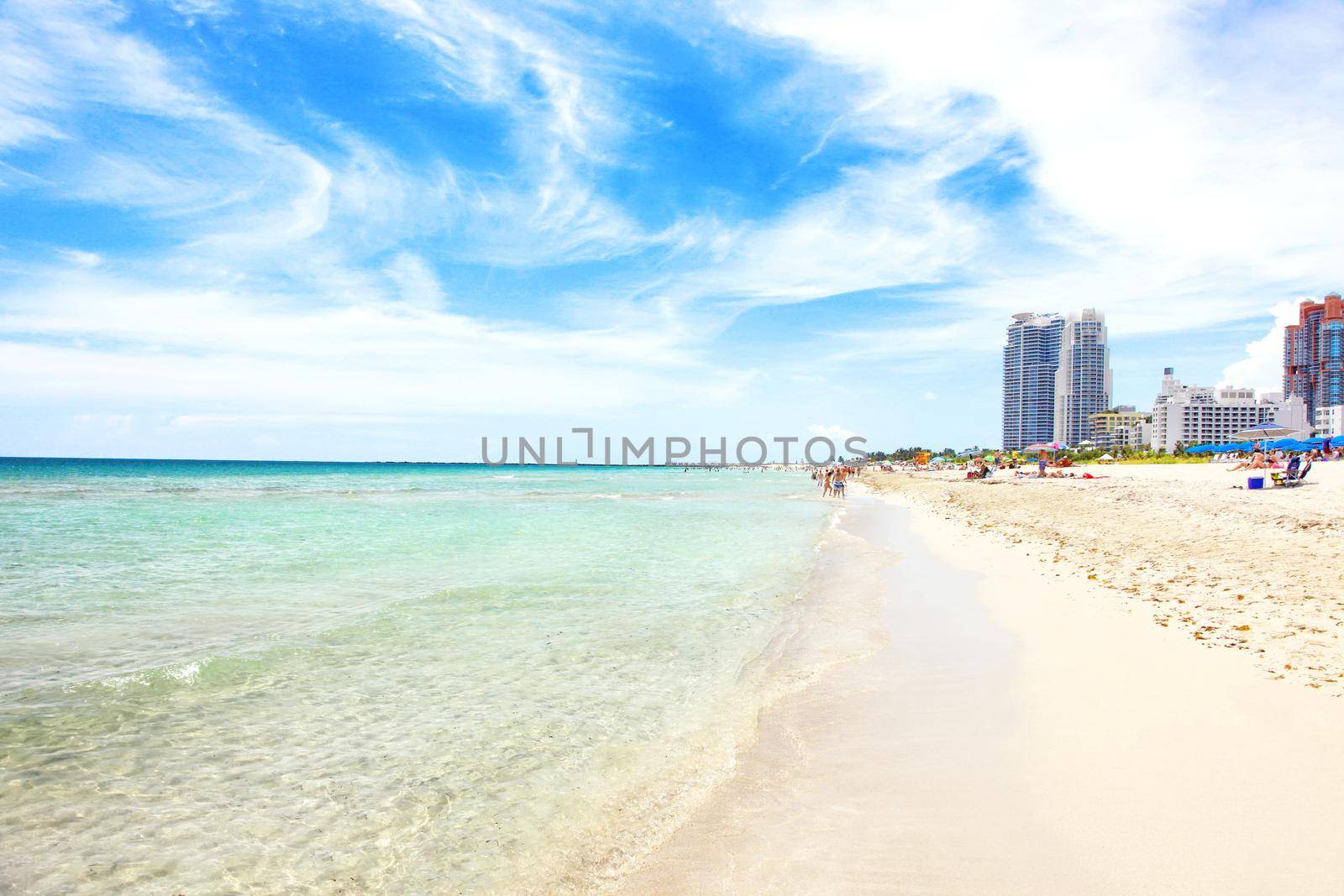 Blue sky and soft sand. Travel and summer vacation background.