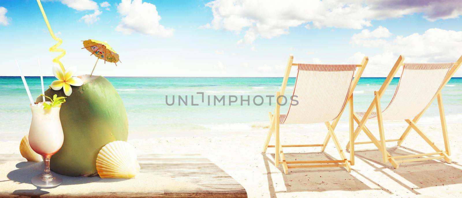 Sandy tropical beach with summer drinks. Holiday background.