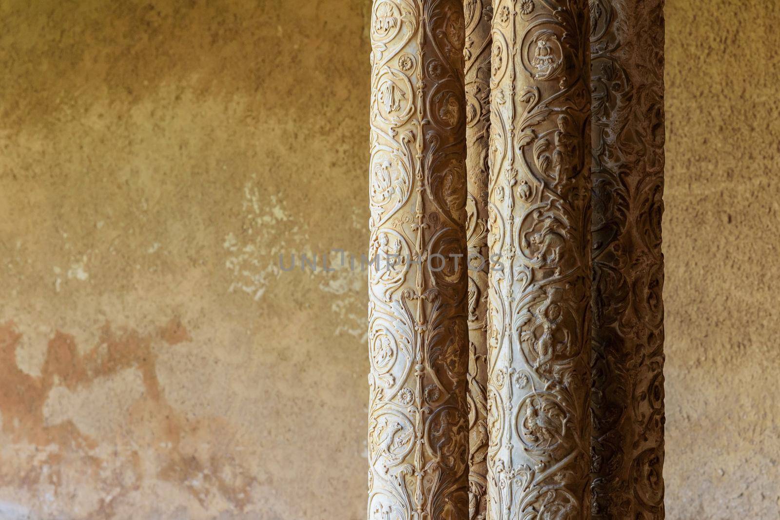 Closeup of decorated columns in the cloister of Monreale Abbey, Palermo, Italy