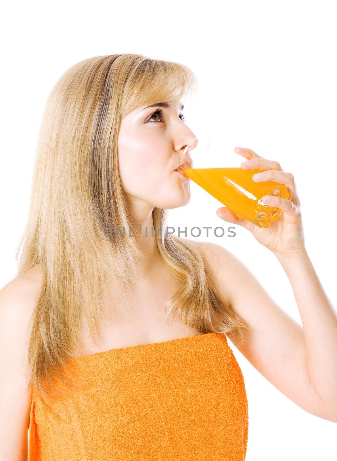 Beautiful woman after bath with orange juice isolated on white