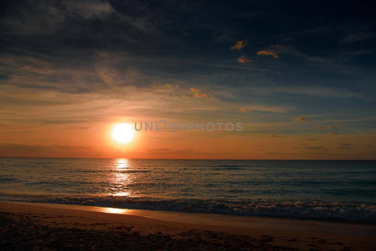 Dawn on the Caribbean Sea. Clear sky with small clouds. Clear weather.