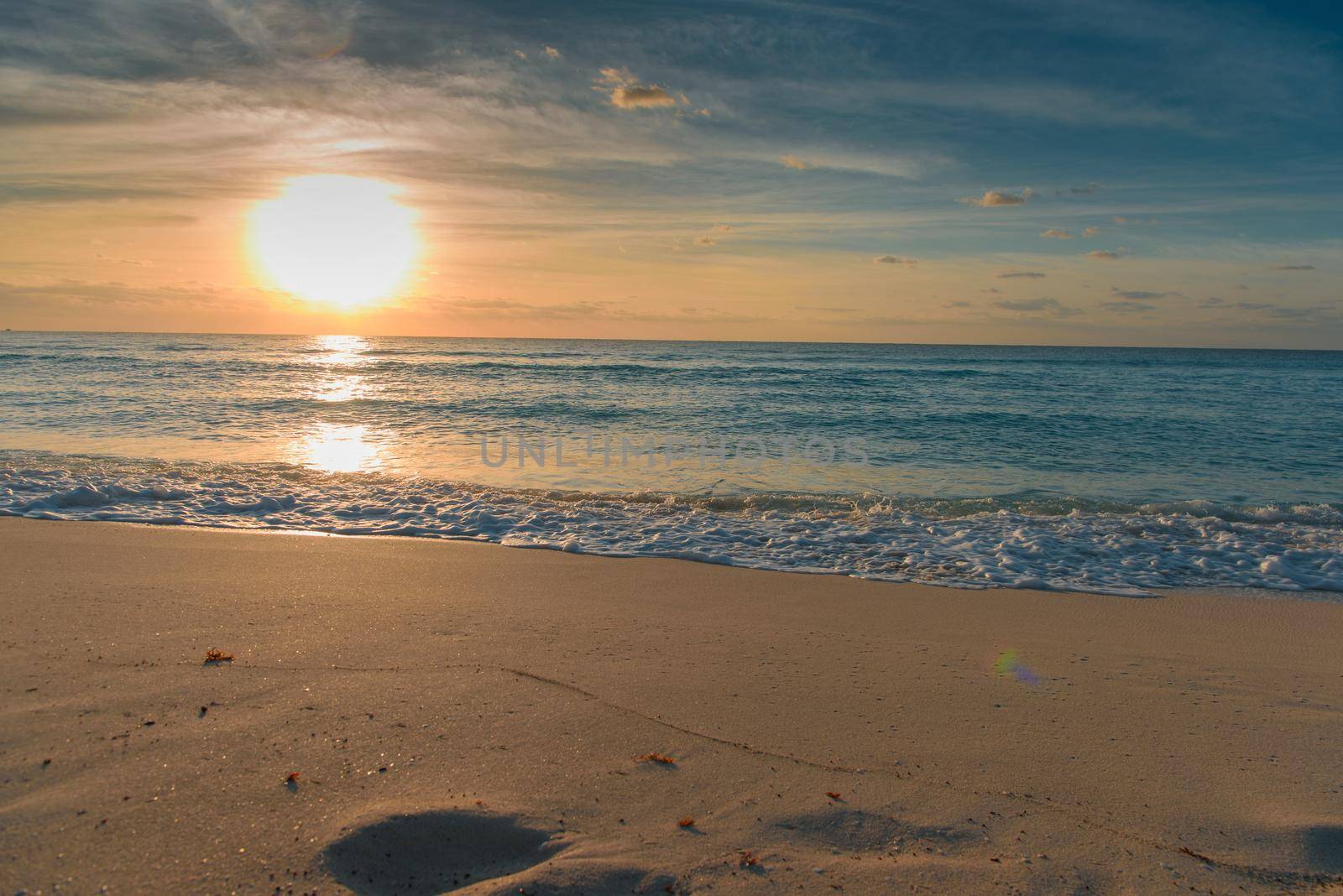 Dawn on the Caribbean Sea. Clear sky with small clouds. Clear weather.