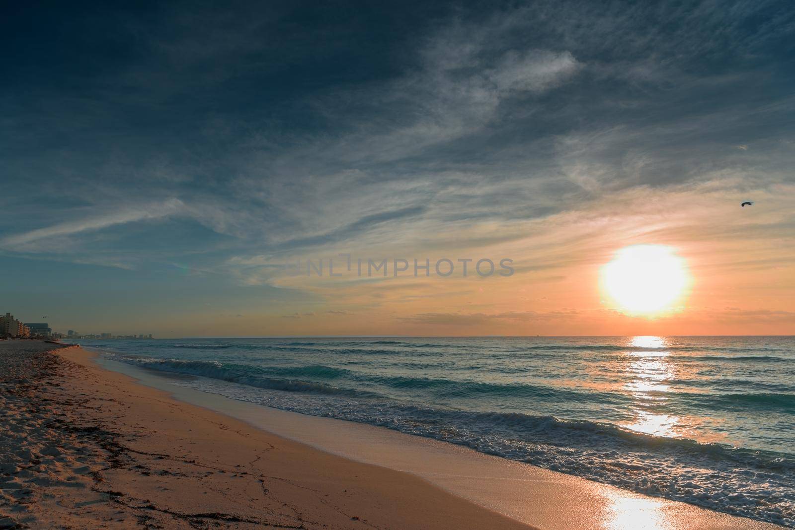 Dawn on the Caribbean Sea. Clear sky with small clouds. Clear weather.