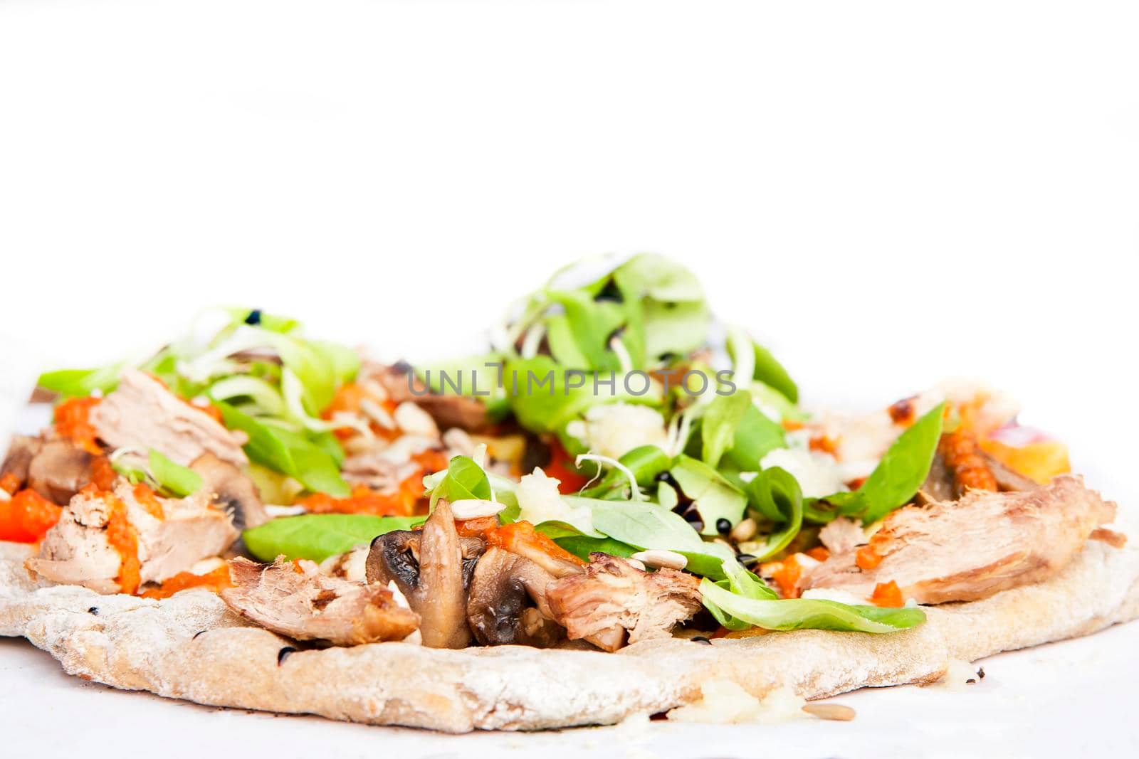 Fresh italian pizza with mushrooms, ham, tomatoes, cheese on light white background. by Jyliana