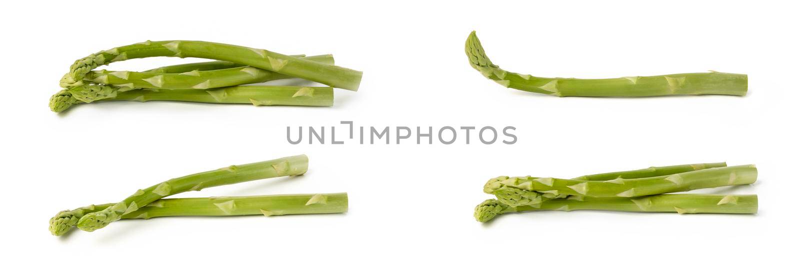 Fresh green asparagus on a white isolated background. Green asparagus isolate with shadow on white background