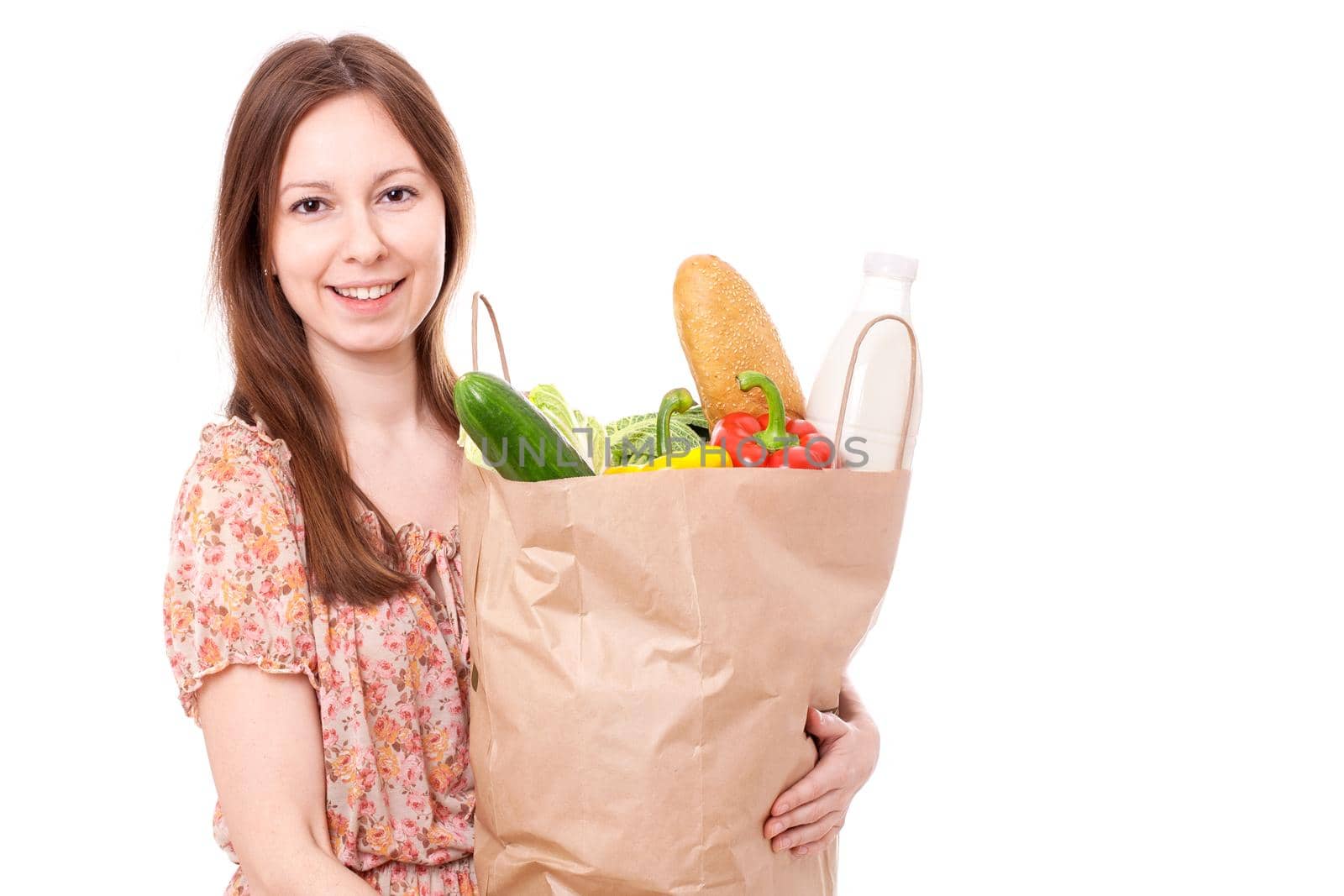 Happy Young Woman Holding Large Bag of Healthly Groceries. Isolated on white