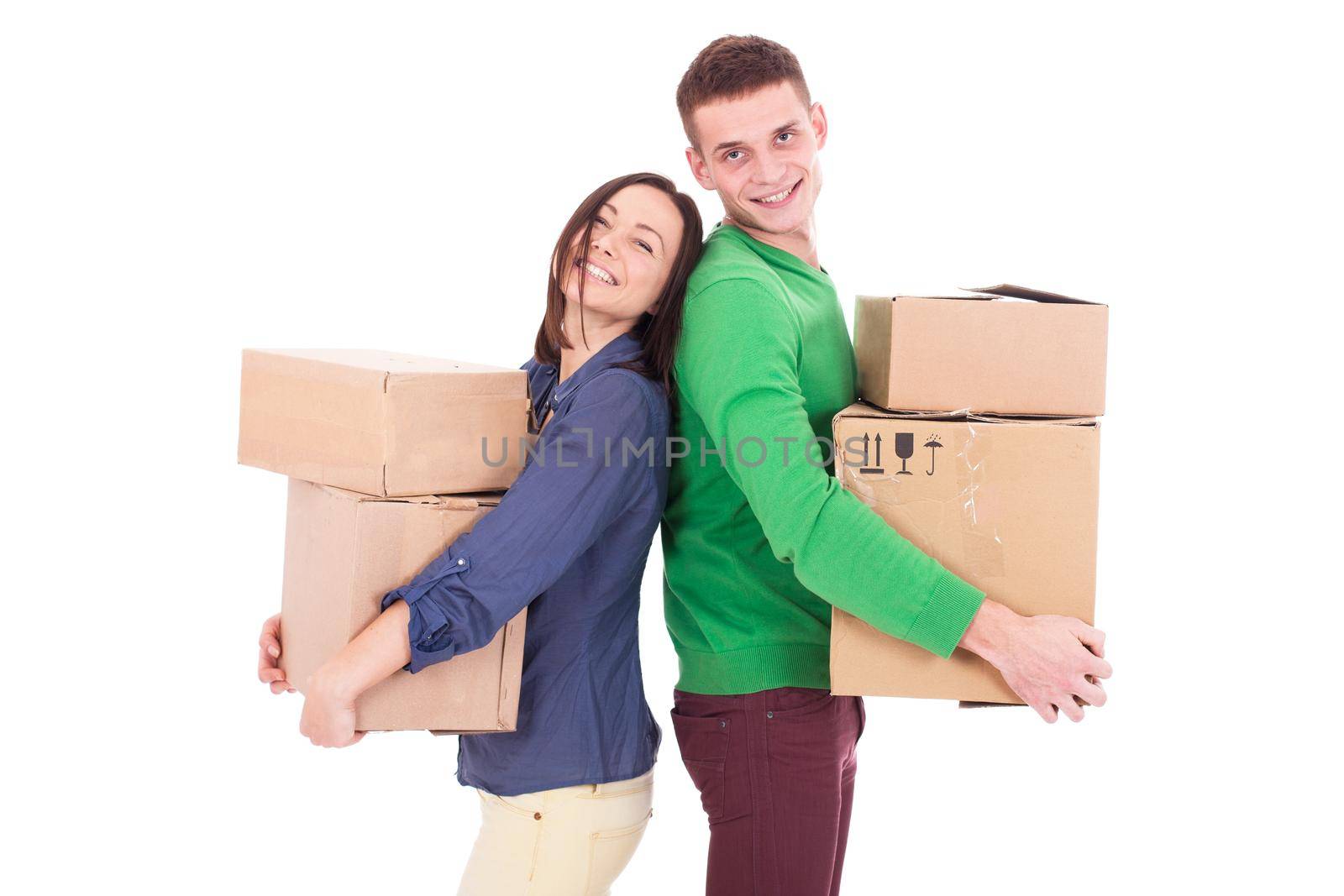 Happy smiling delivery man and woman carrying boxes isolated on white background by Jyliana