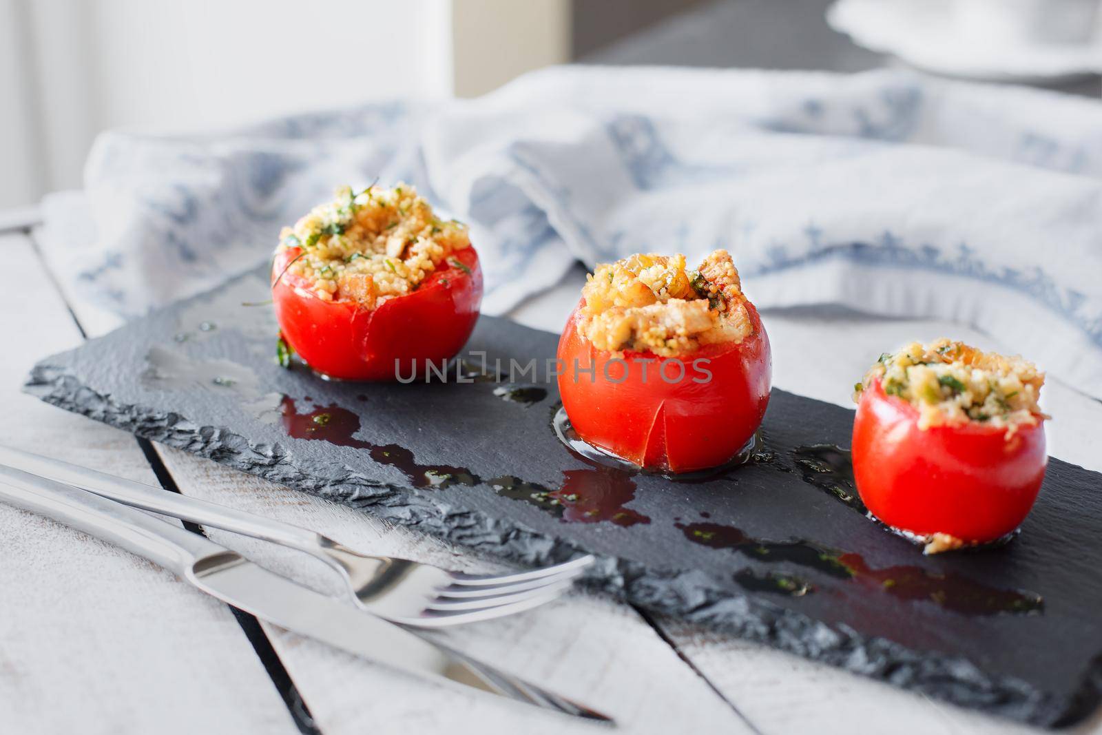 Tomato stuffed with couscous by Jyliana