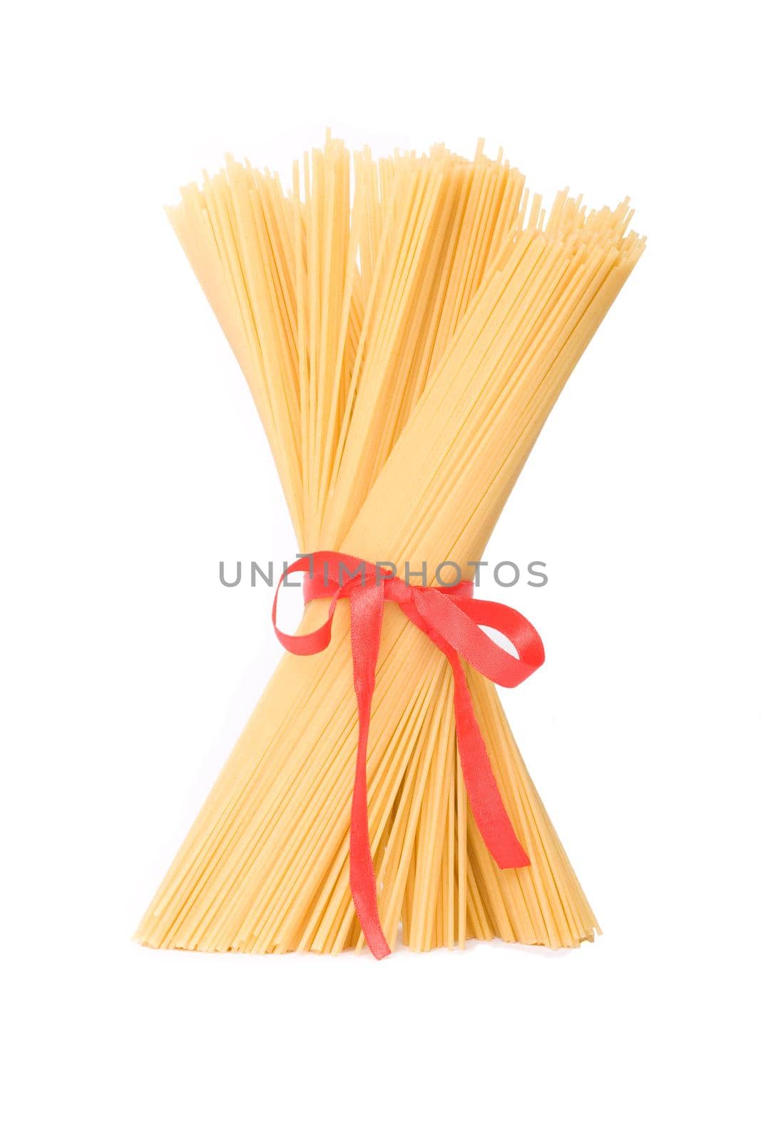 spaghetti tied up with red ribbon isolated