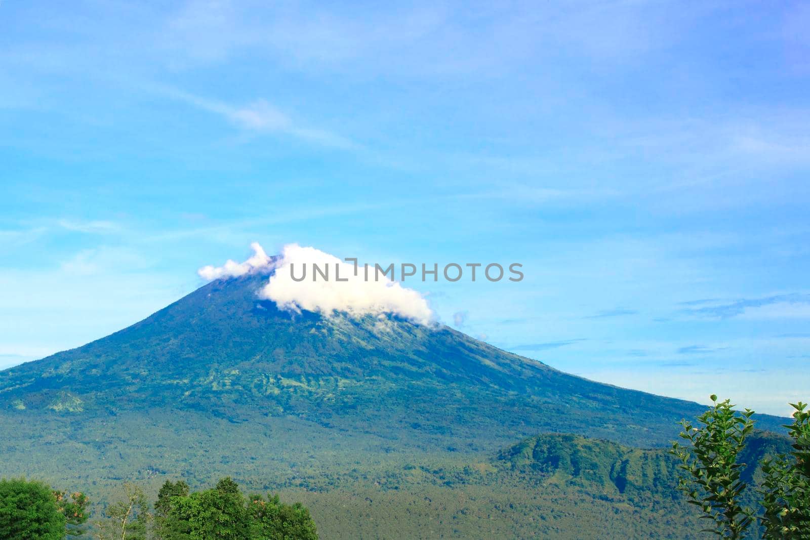 Pura Lempuyang temple with Mount Agung in the background in Bali, Indonesia by Jyliana