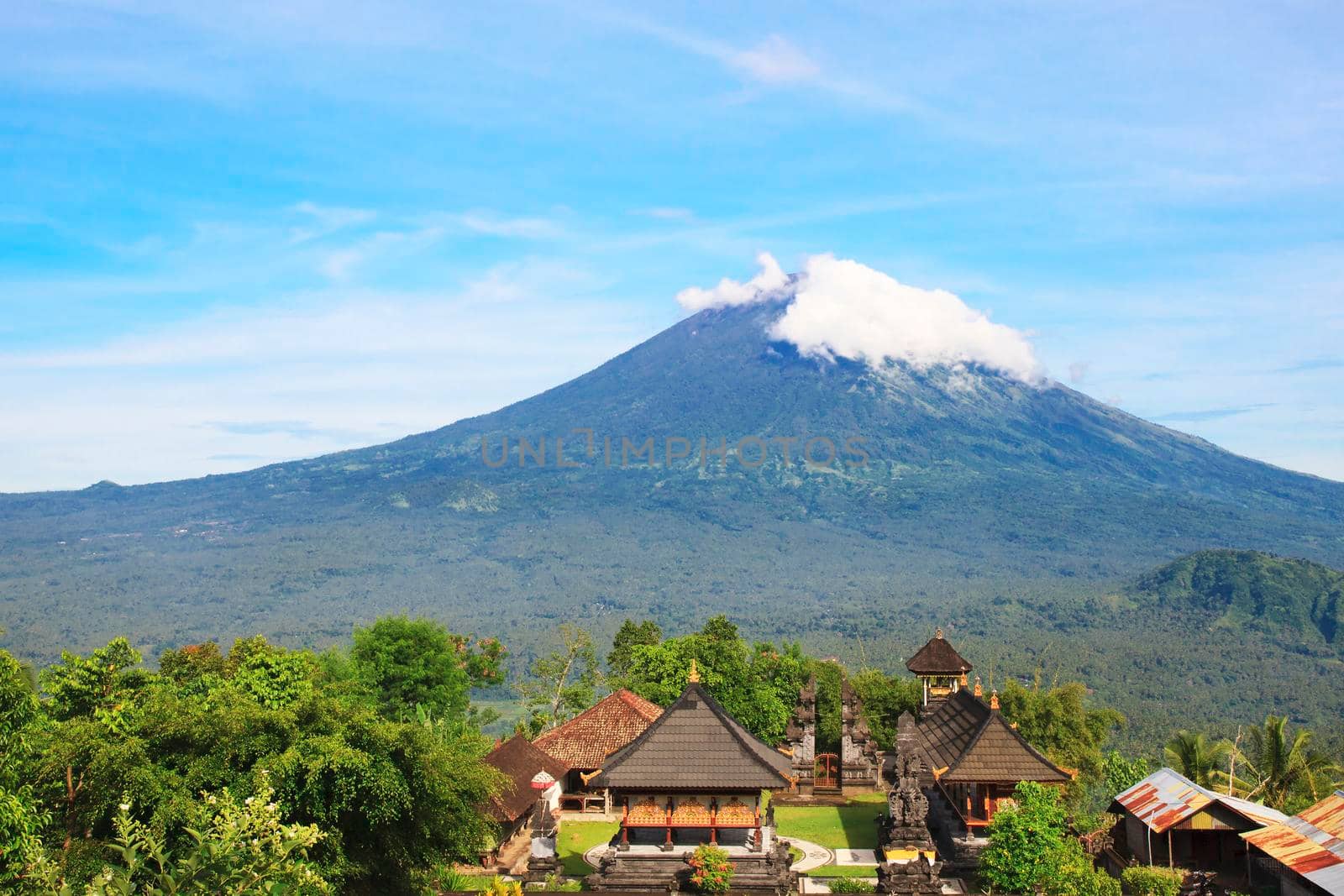 Pura Lempuyang temple with Mount Agung in the background in Bali, Indonesia by Jyliana