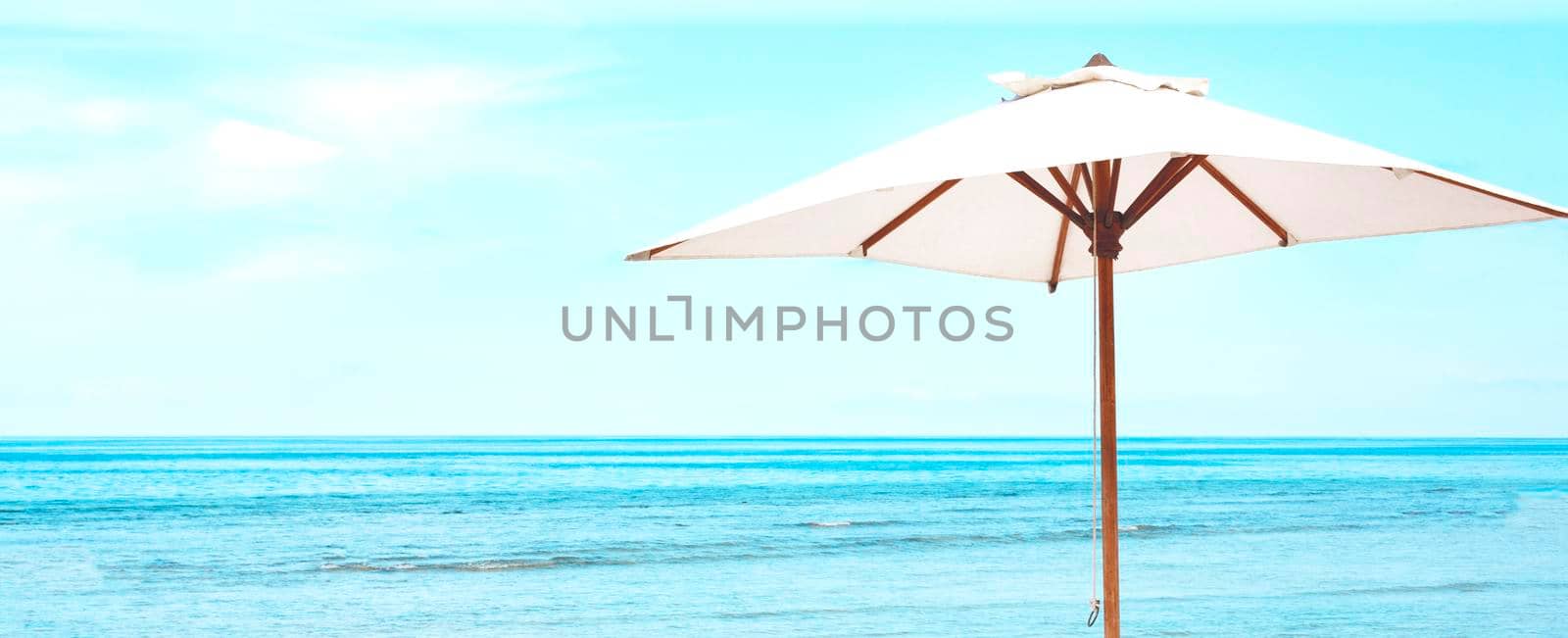 Beach Sun parasol on the blue sky