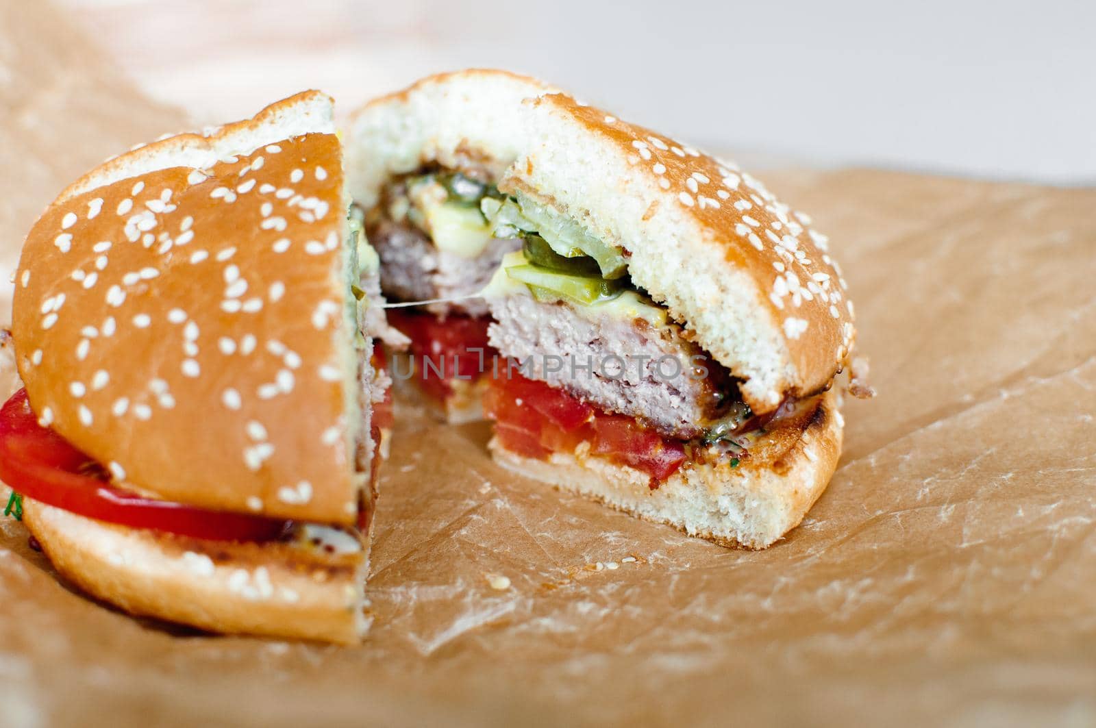 Homemade hamburger or cheeseburger with fresh vegetables