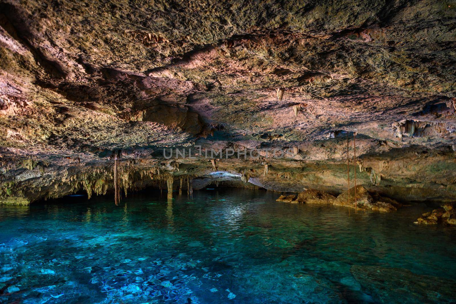 Cenote Dos Ojos with clear blue water in the cave