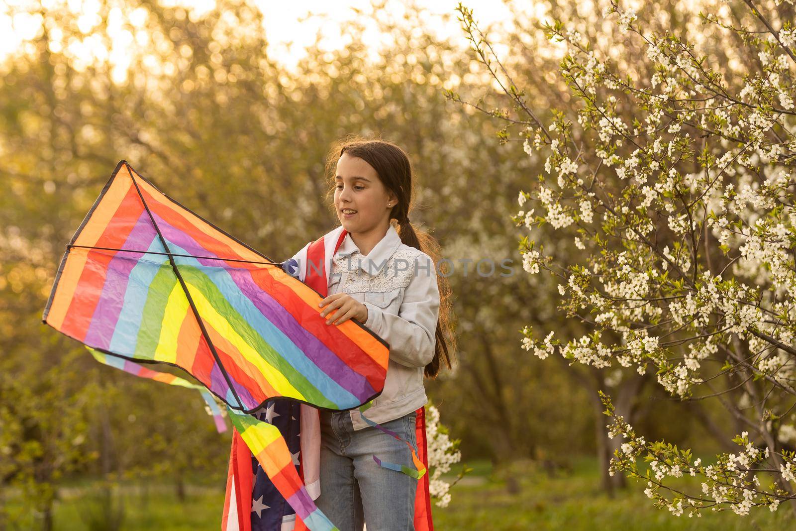 little girl with kite and usa flag by Andelov13