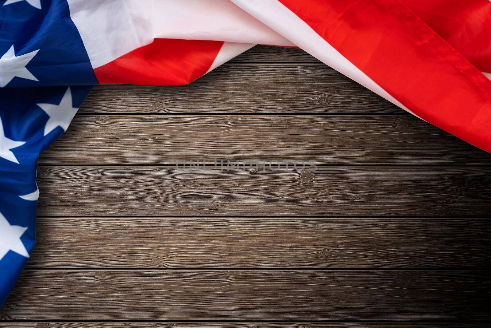 United States Flag on a rustic wooden table with copyspace