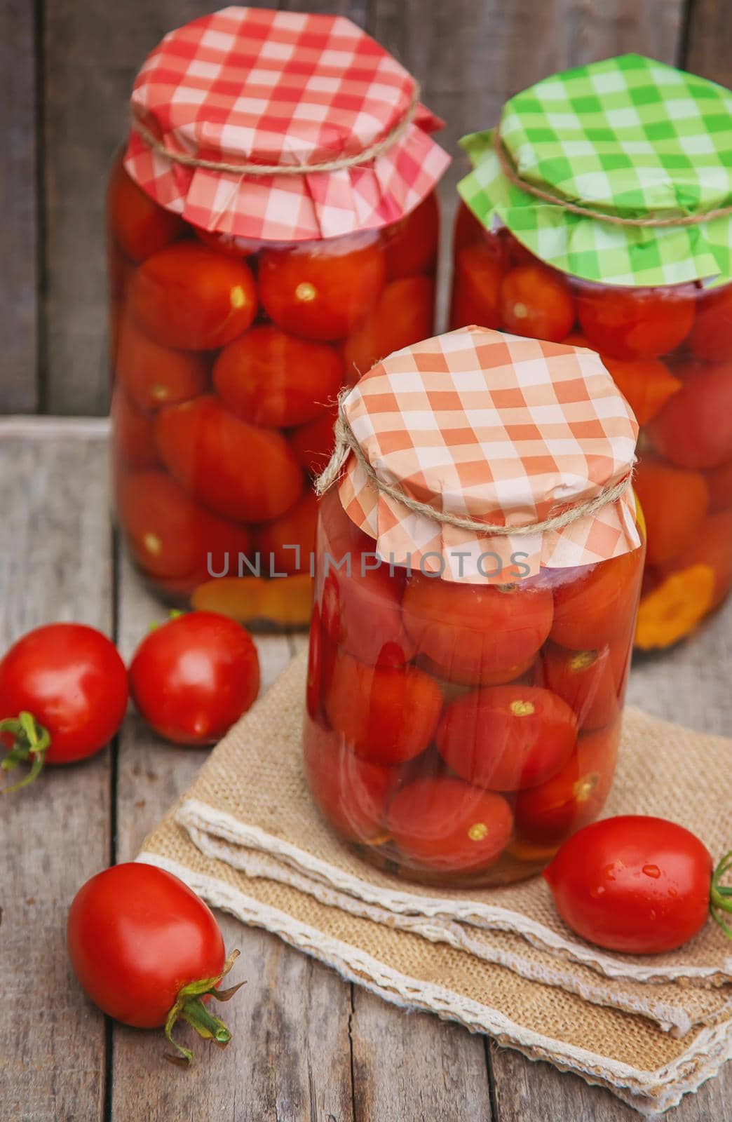 Preservation of homemade tomatoes. Food. Selective focus. by yanadjana