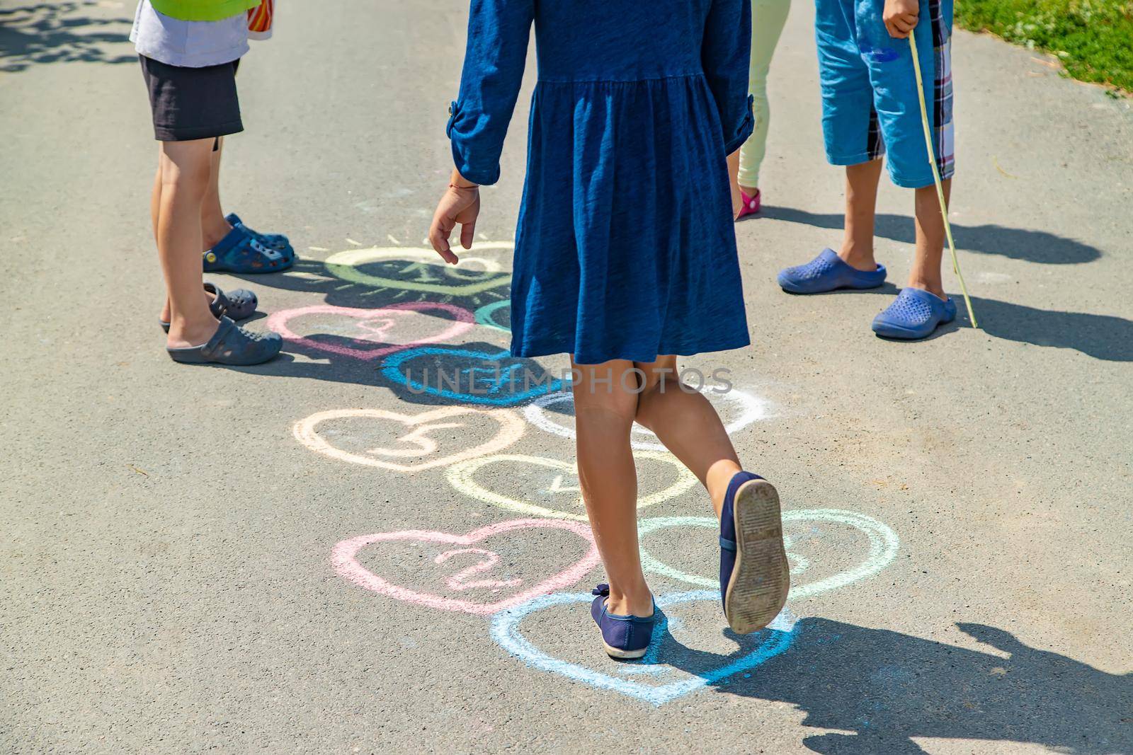 Children's hopscotch game on the pavement. selective focus. by yanadjana