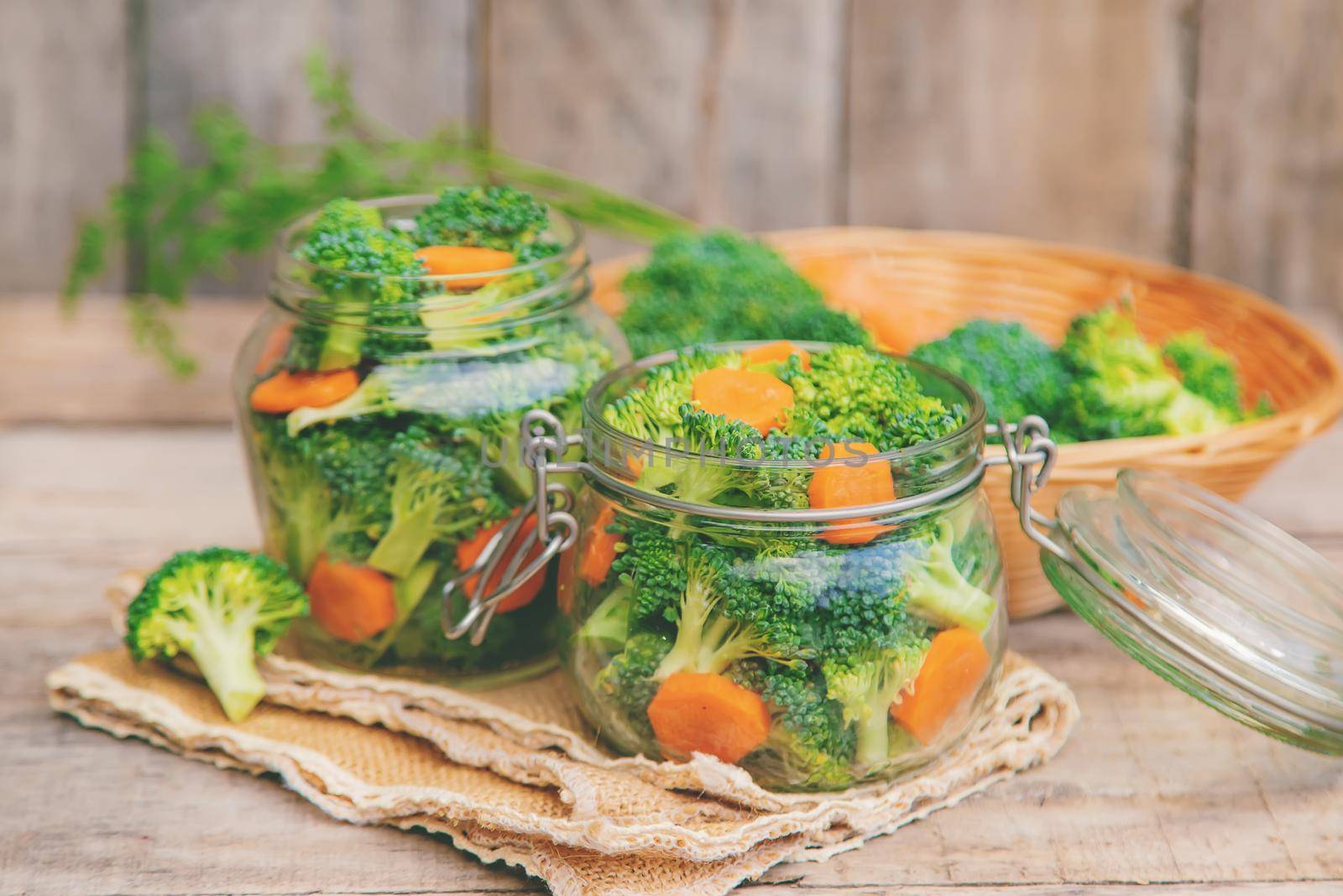 Preservation of broccoli with carrots in jars. Selective focus. nature.