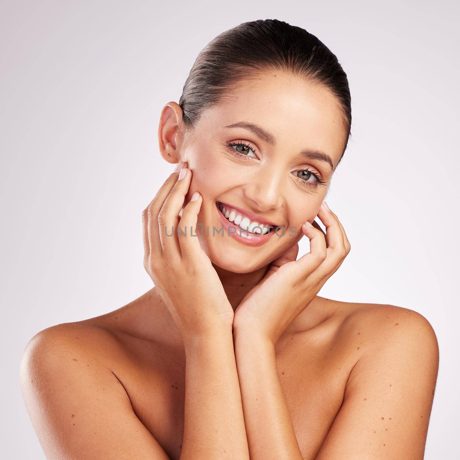 Shot of an attractive young woman posing against a studio background.