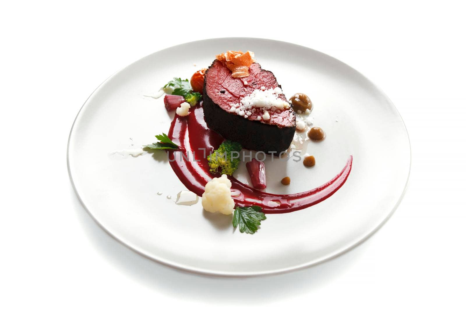 Delicious modern veal fillet served with sauce. Molecular cuisine with steak.