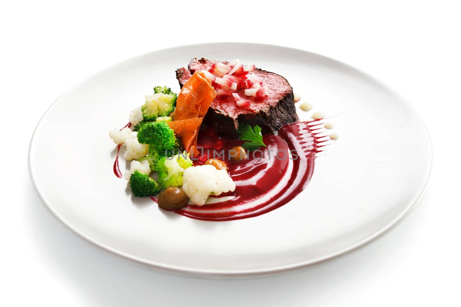 Delicious modern veal fillet served with sauce. Molecular cuisine with steak.