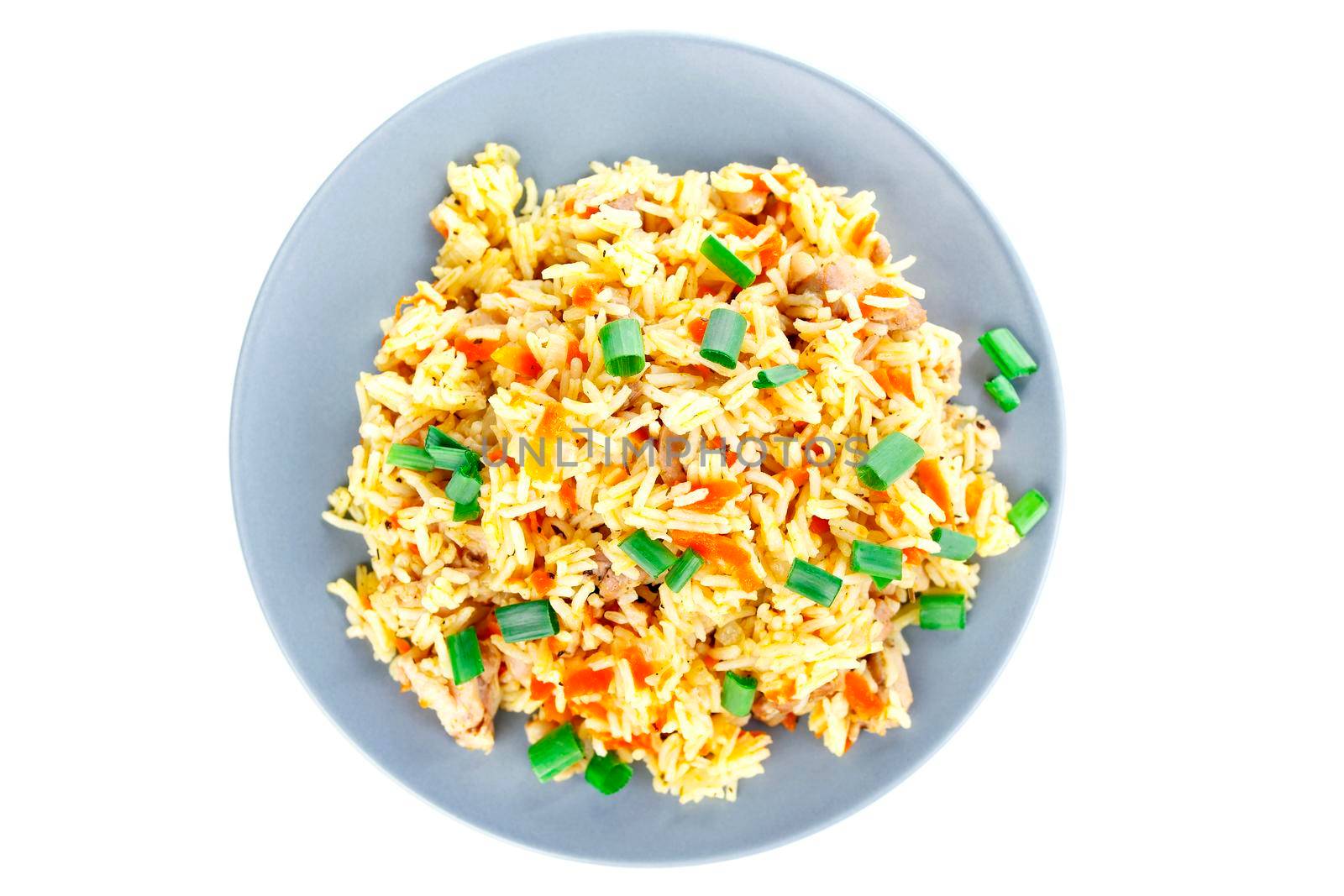 Fragrant Pilau Pulav pilaf pilaf, fried rice with meat and vegetables on a grey plate. Isolated on white. Macro.