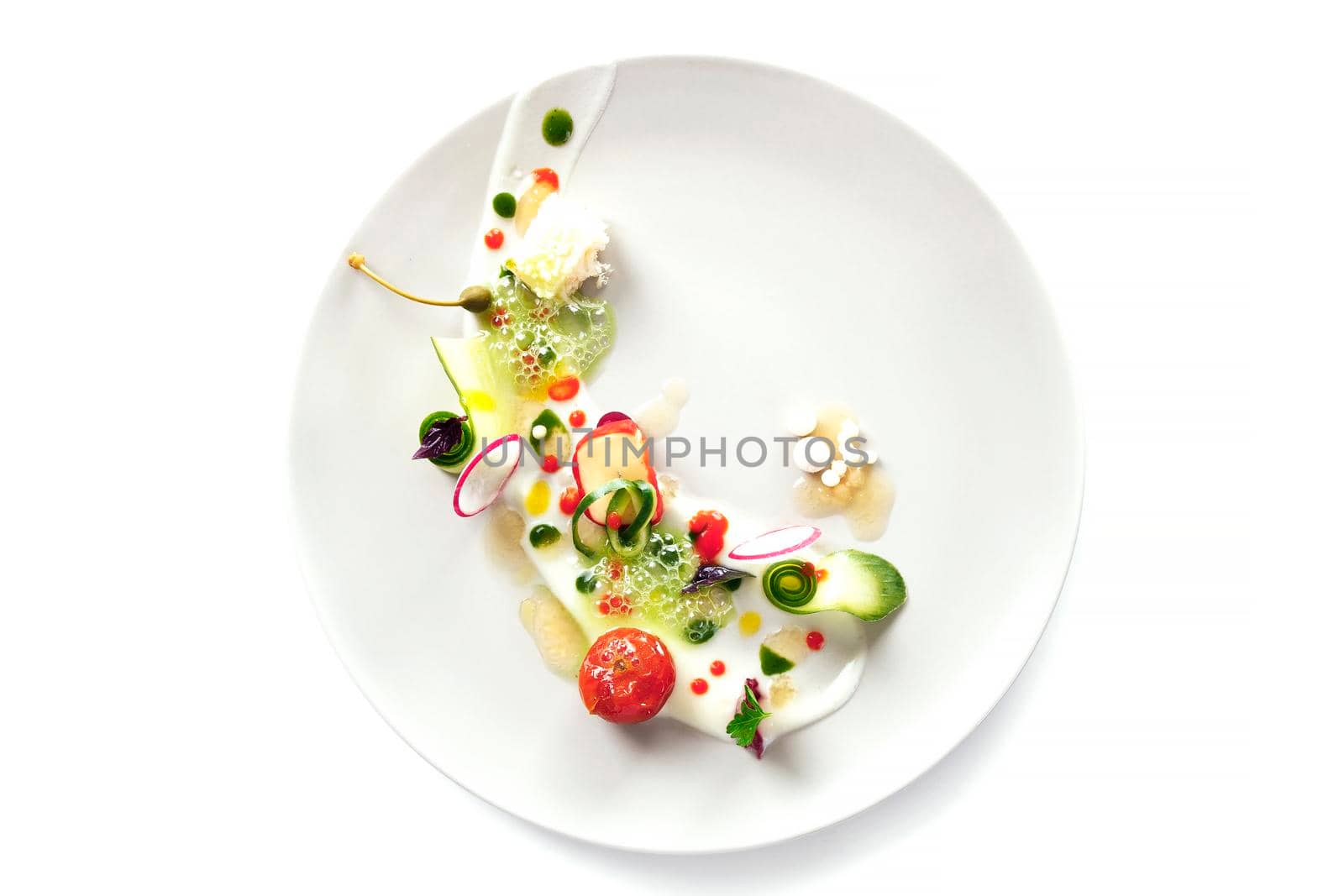 Molecular modern cuisine vegetable salad. Stock image. Isolated on white.