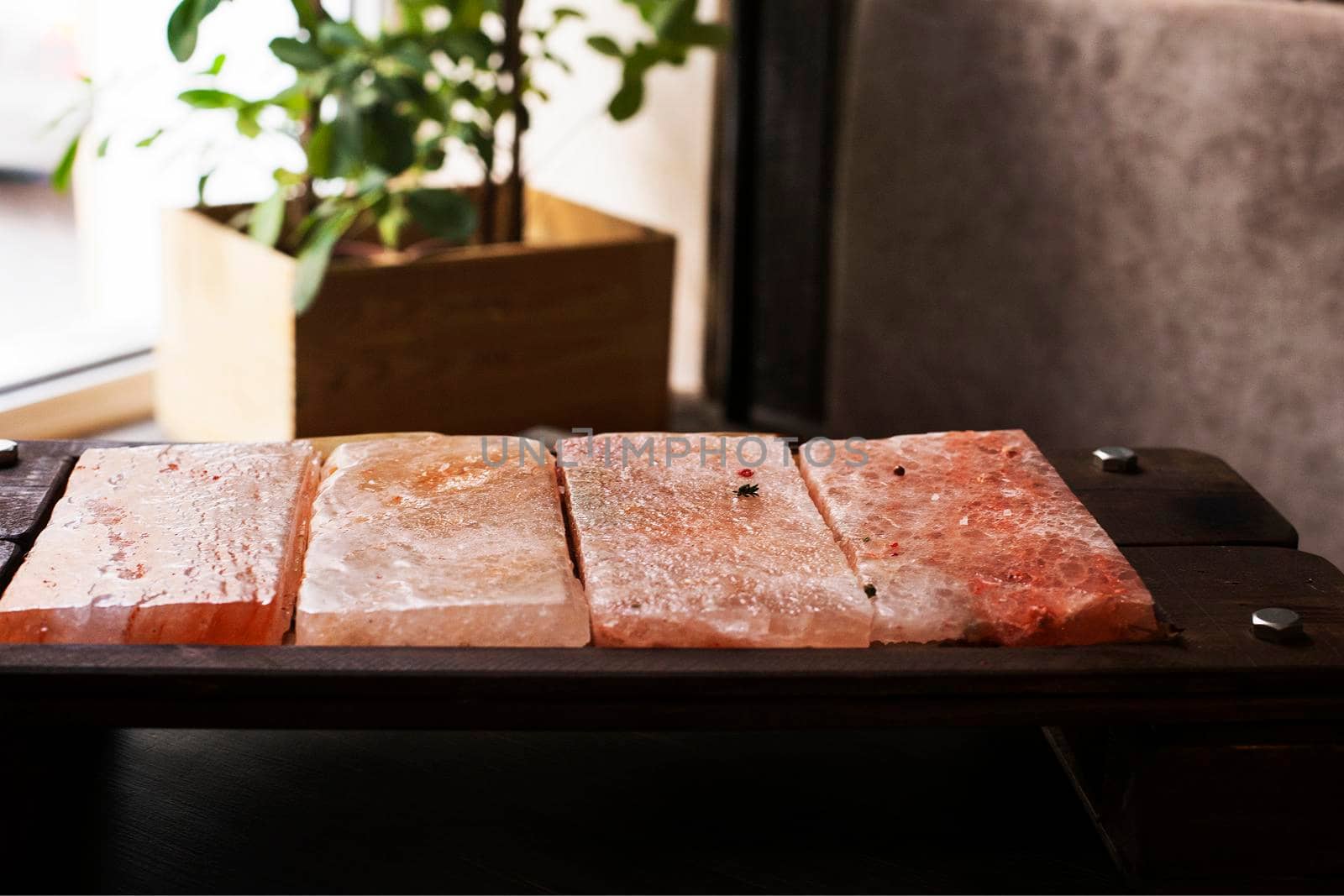 Himalayan pink salt. Salt plates. Bars of salt for cooking.